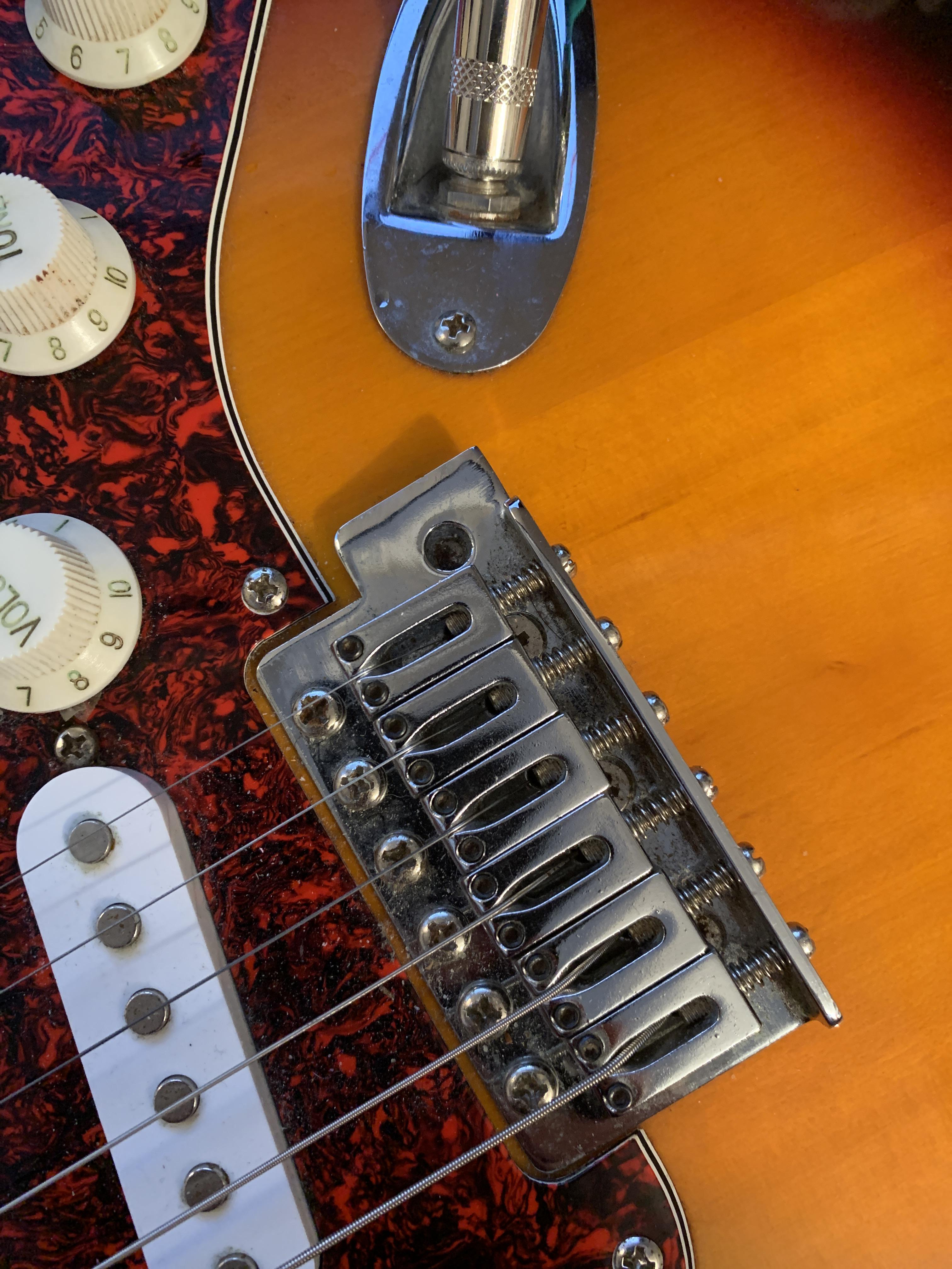 my whammy bar broke off and some of it is still in there raising the