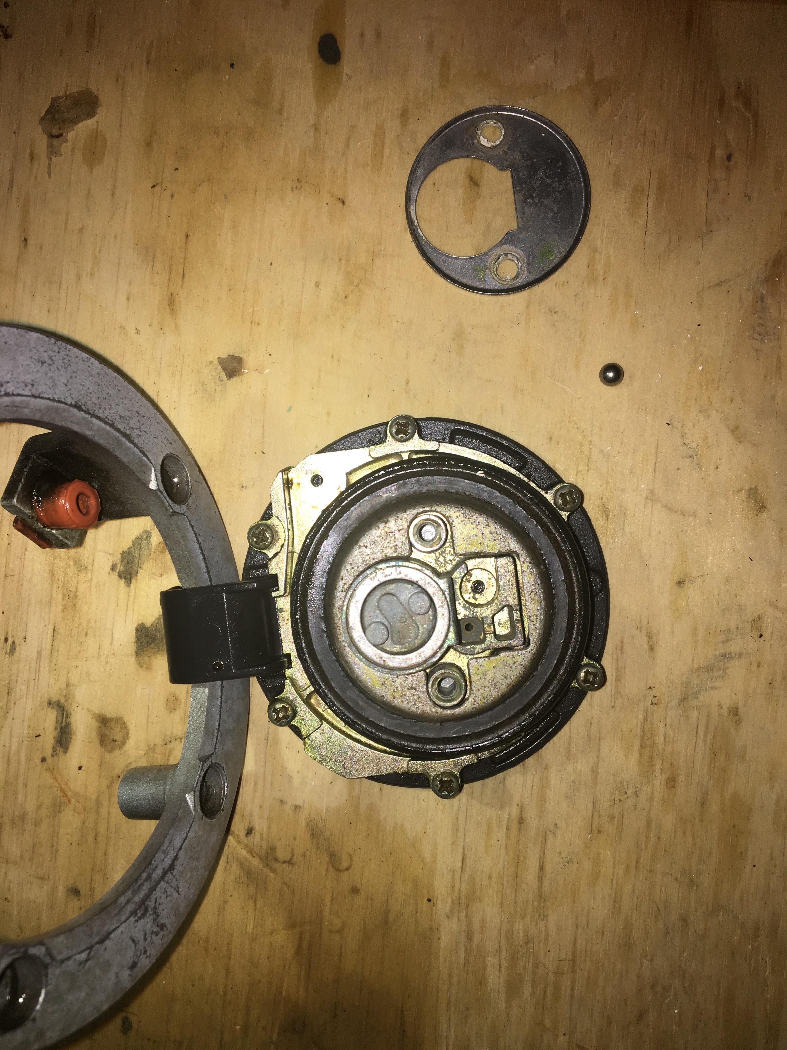 Disassembled gas tank cap, but having venting problems. I may have put the metal bb in the wrong