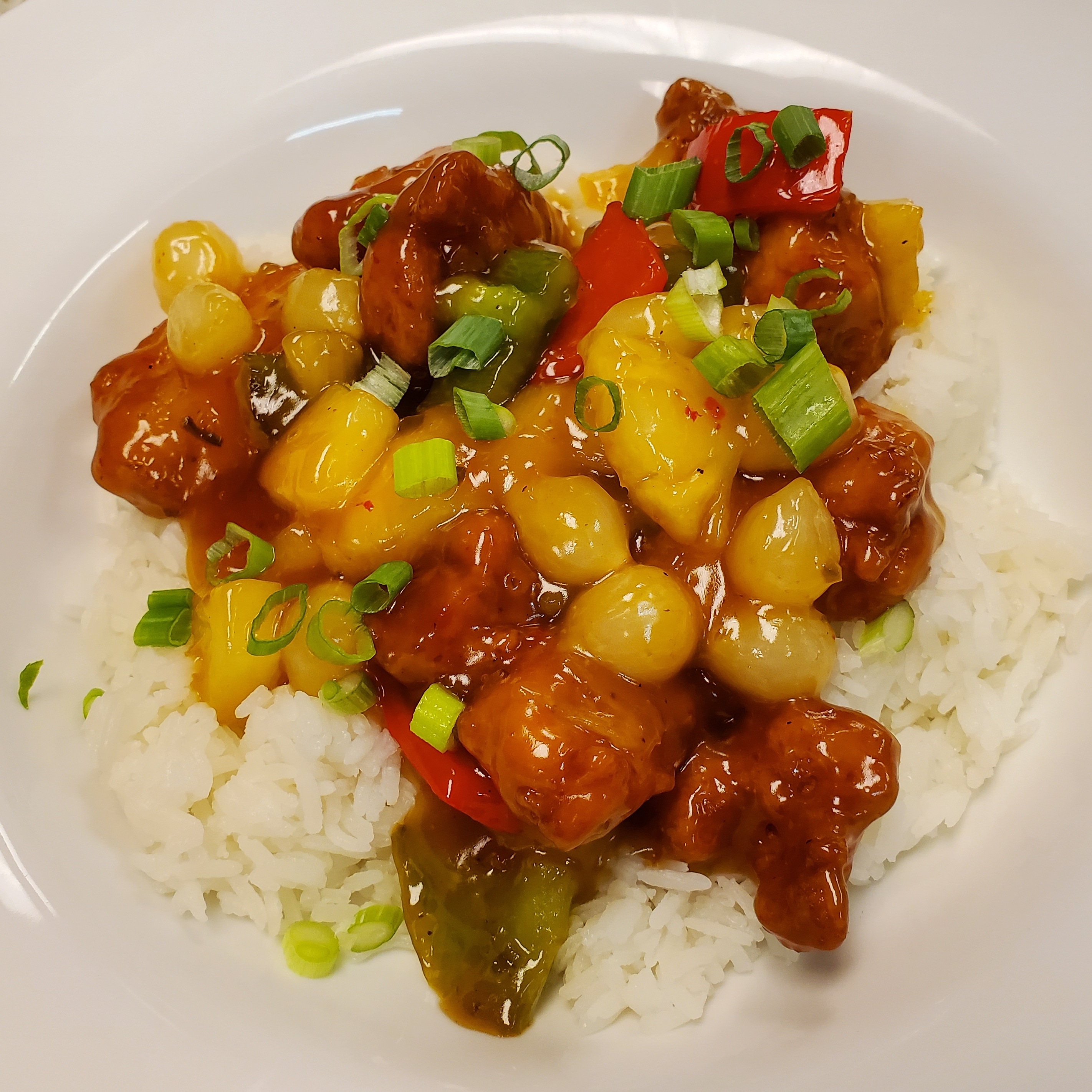 Sweet and sour chicken over jasmine rice. r/FoodPorn