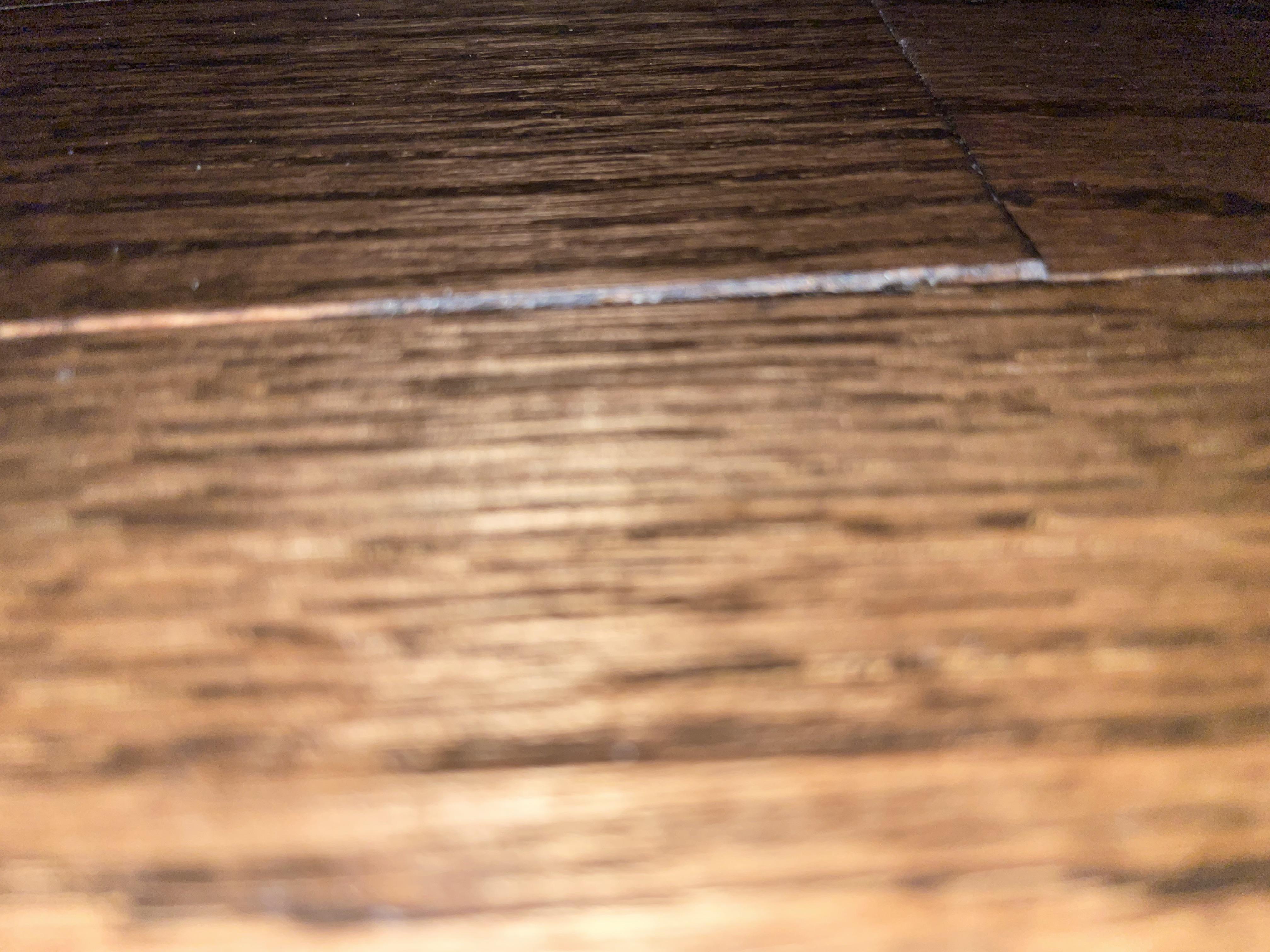 Dishwasher was leaking now hardwood crowning, will it go back down? r