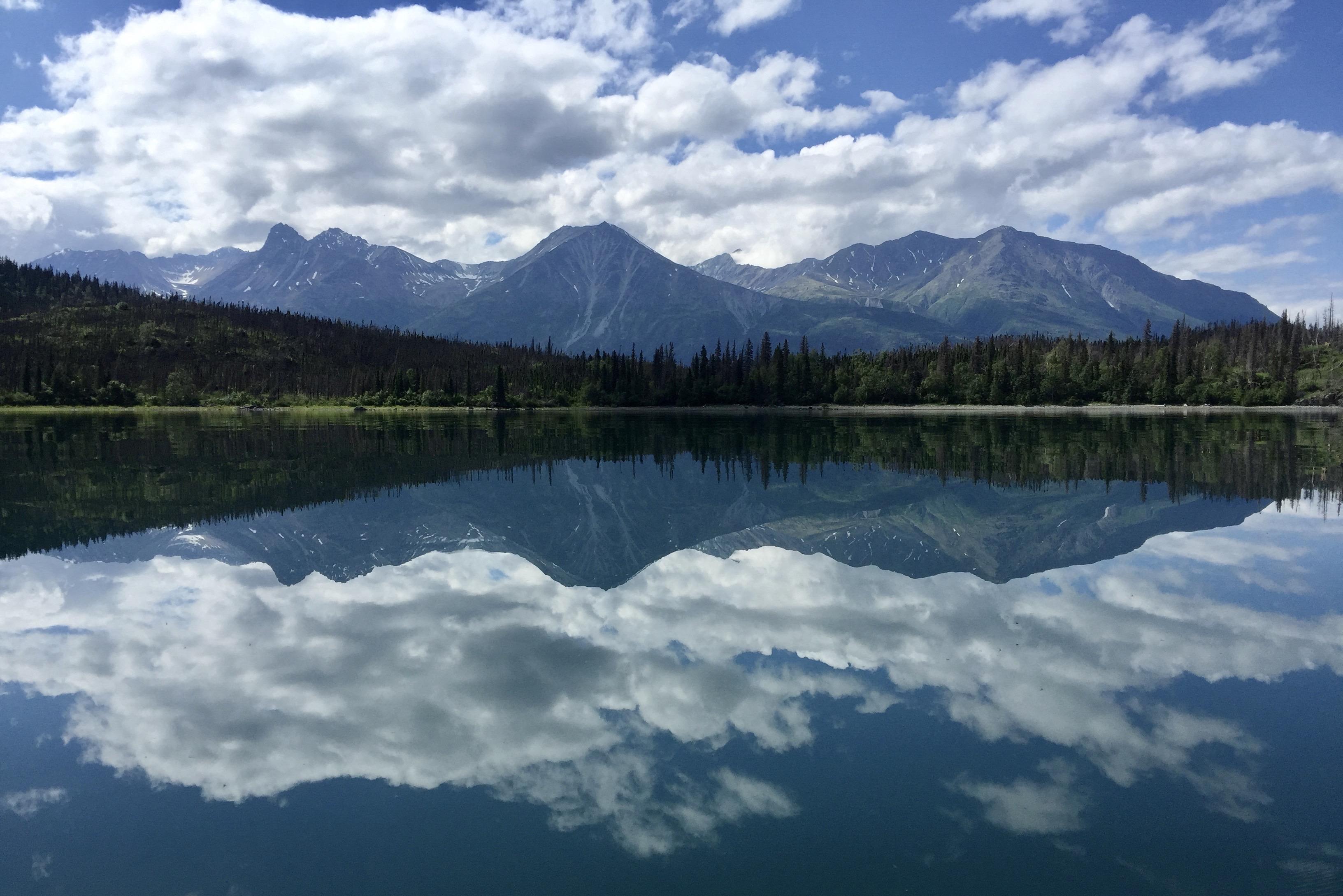 A mirrorlike Lake Clark reflects the scenery, Lake Clark National Park