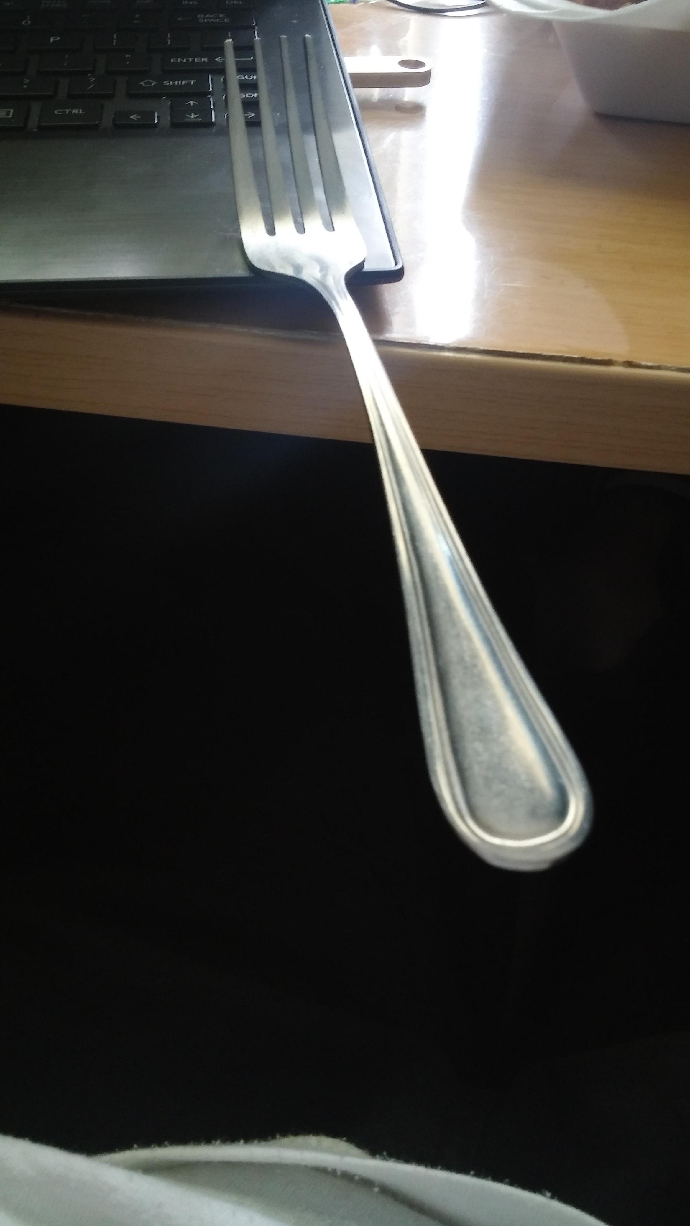 My fork is to my laptop r/mildlyinteresting