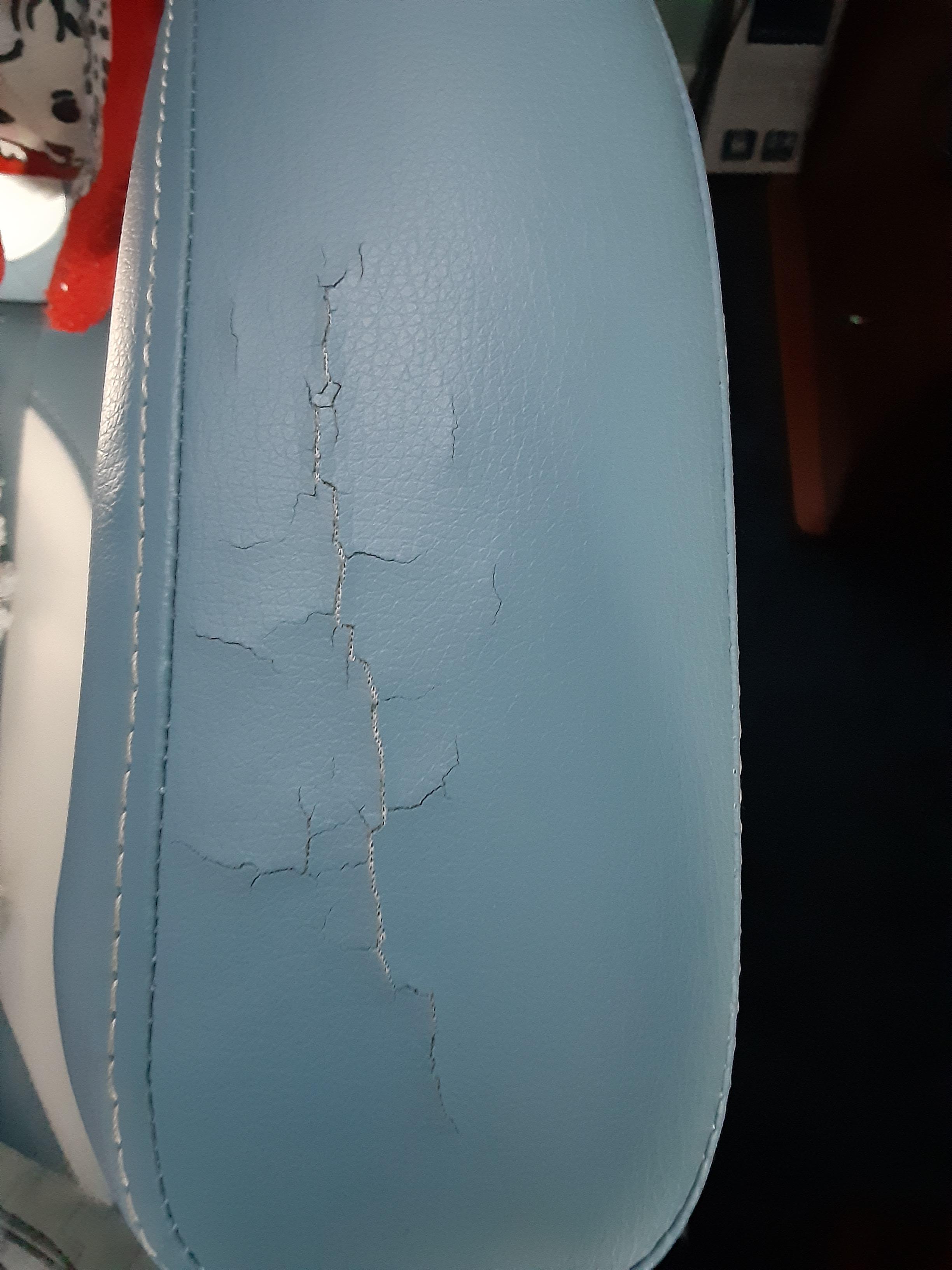 I love my chair so much I use scarf to cover this rips. How to I fix it