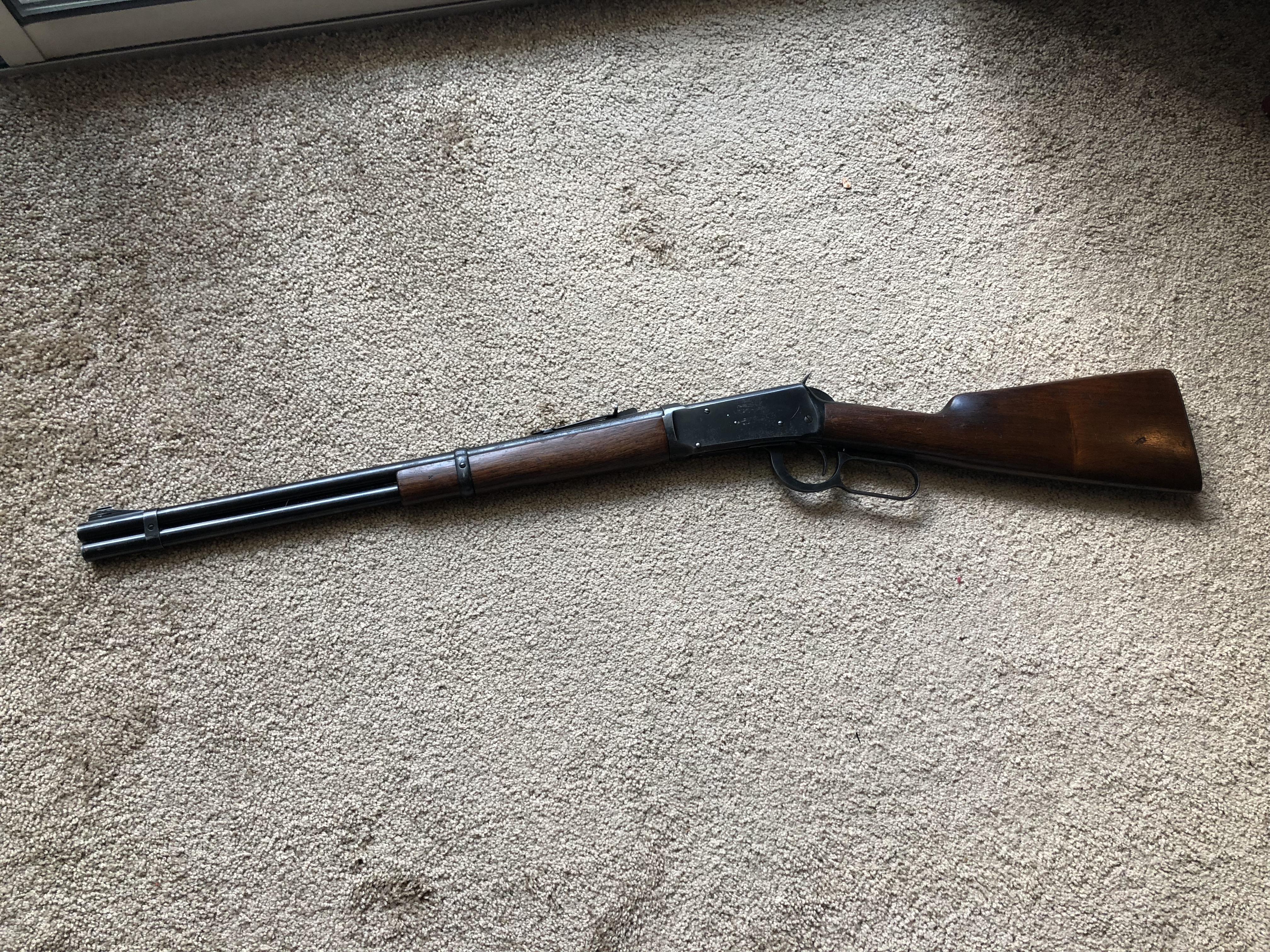 A Winchester 3030 Model 9430 lever action rifle. According to the