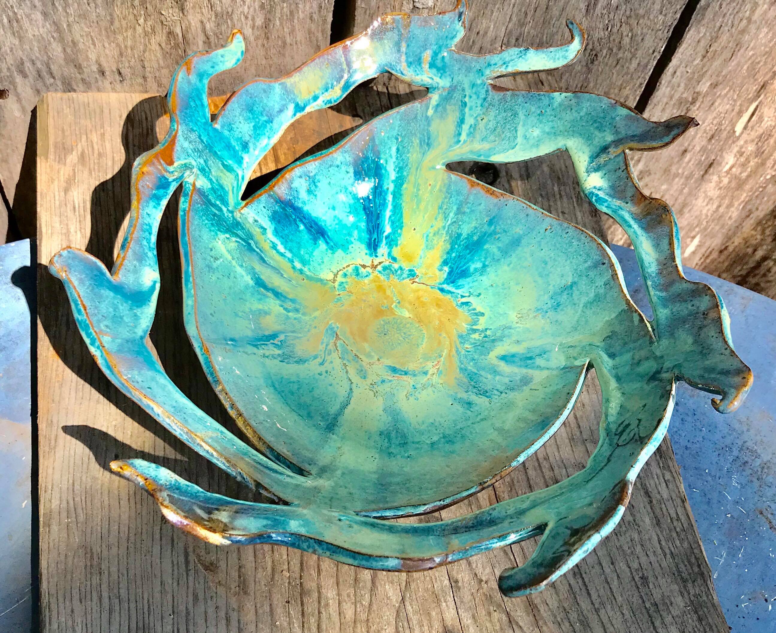 Layered glazes on stoneware clay, hand carved bowl. r/Pottery