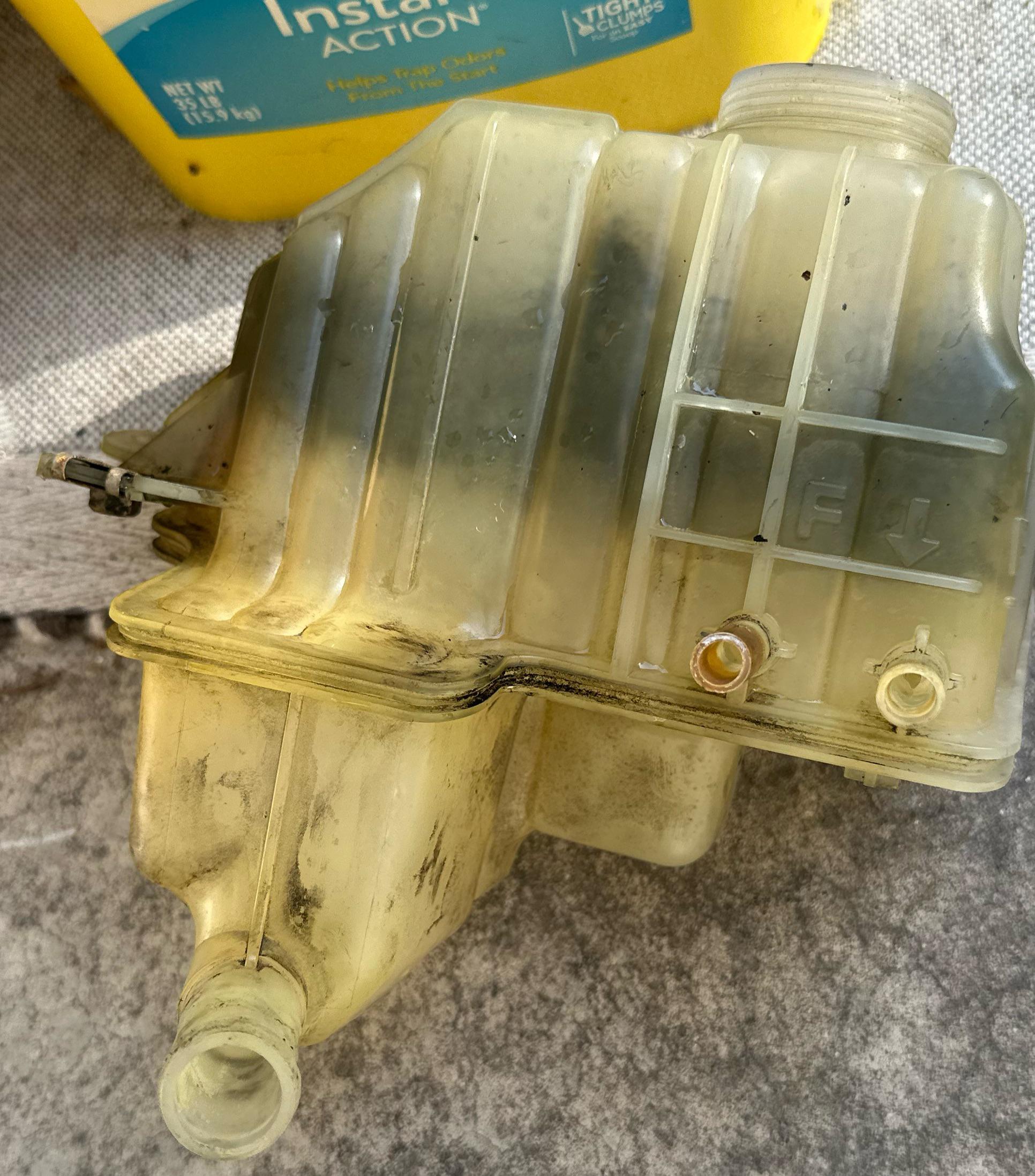 Coolant reservoir is dirty. Tried dish soap, vinegar, even sulfa mix