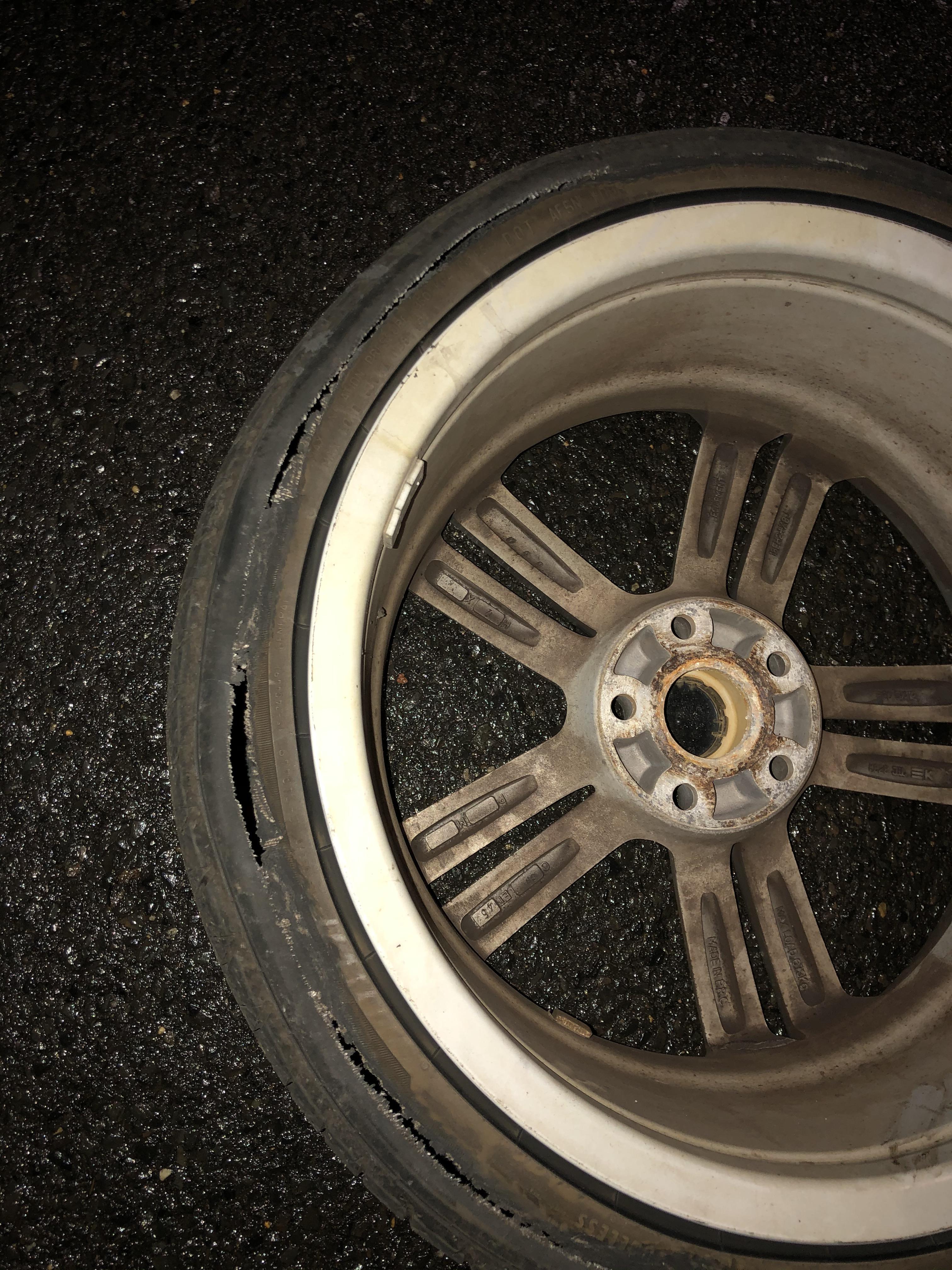 2015 VW Jetta GLI. Rear left tire, torn 3/4 of the way. What could