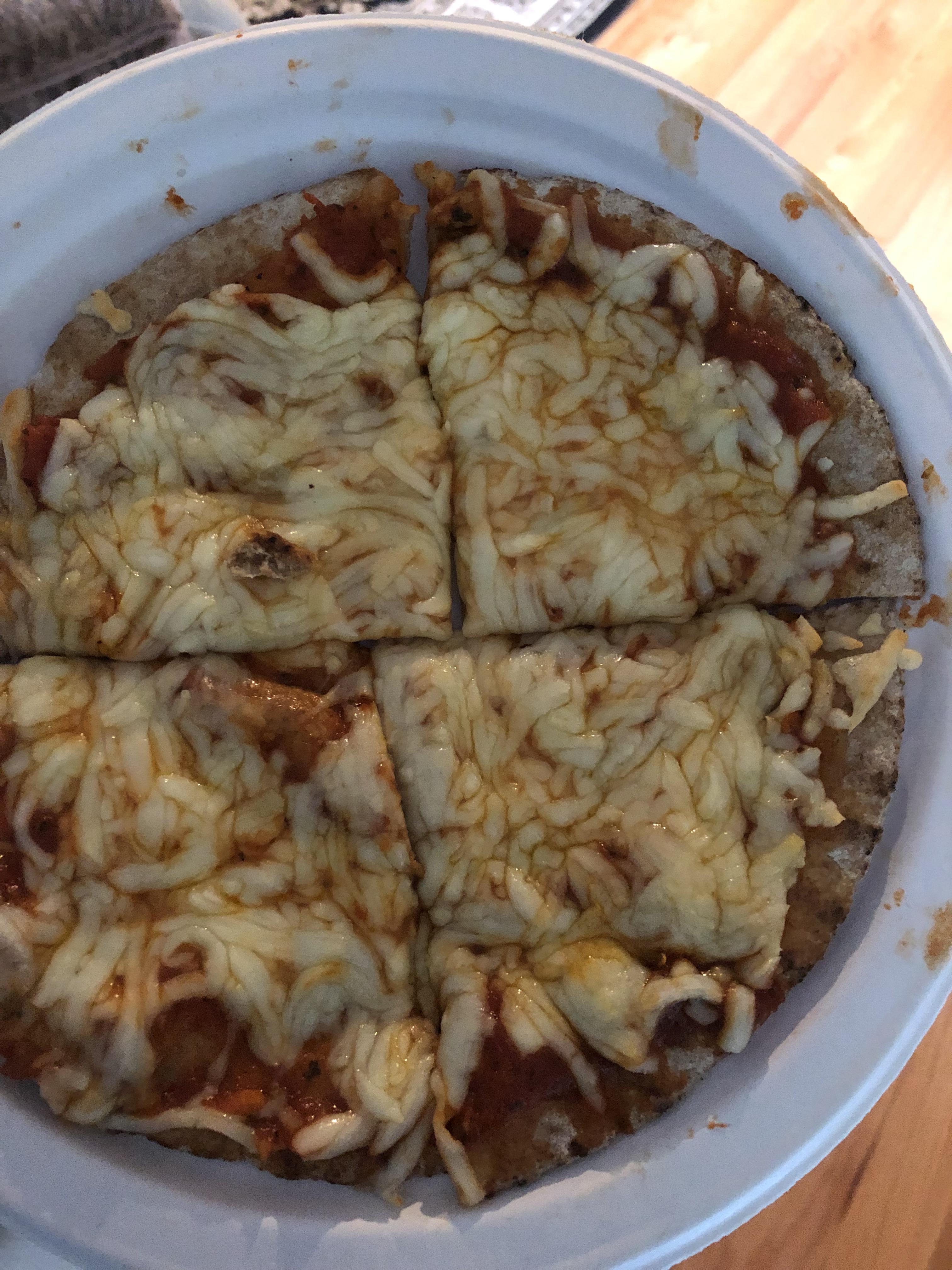 Made a Pita bread pizza for dinner that was hard to look at but easy to