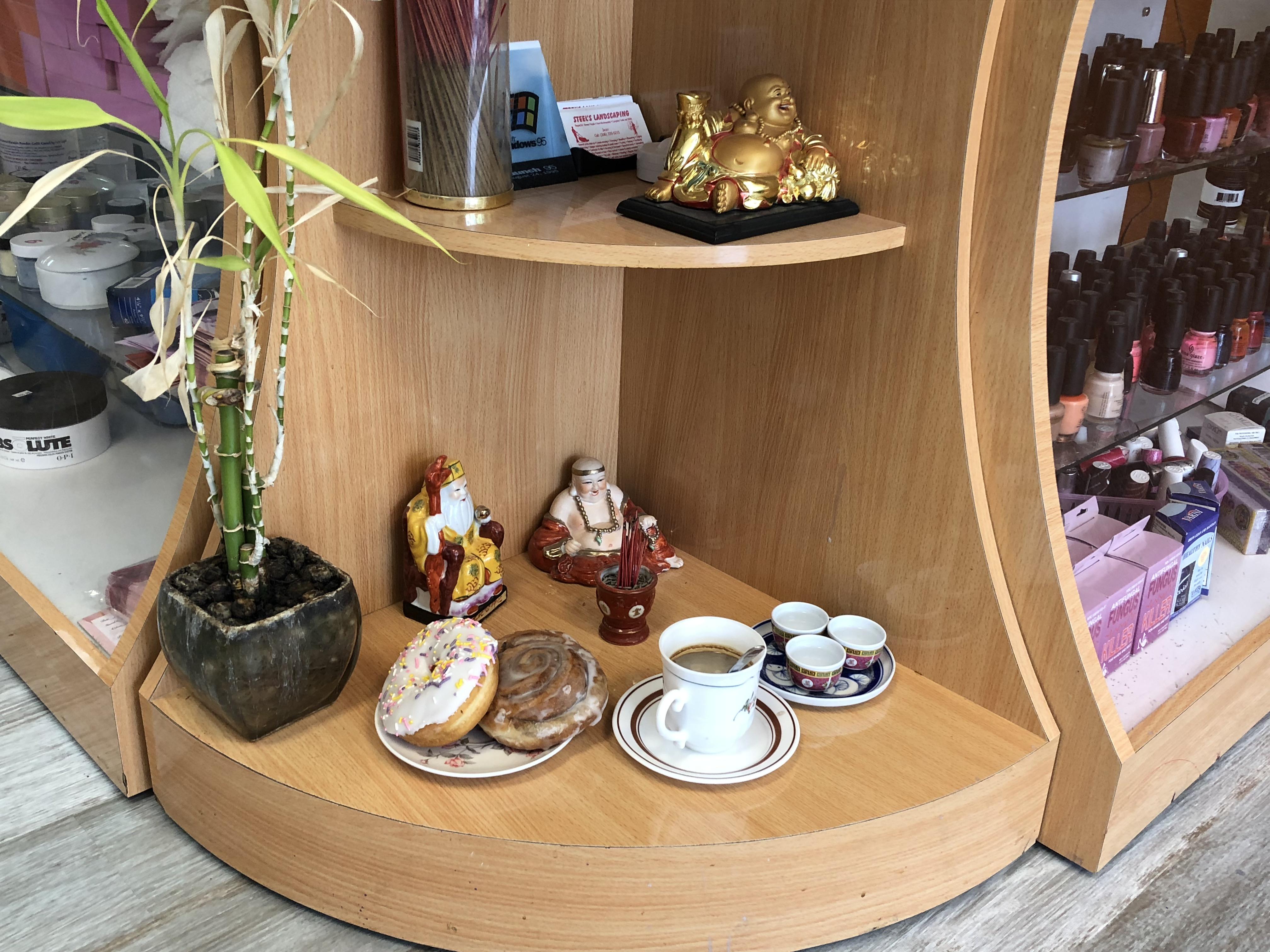 This nail salon’s offerings to Buddha. r/mildlyinteresting
