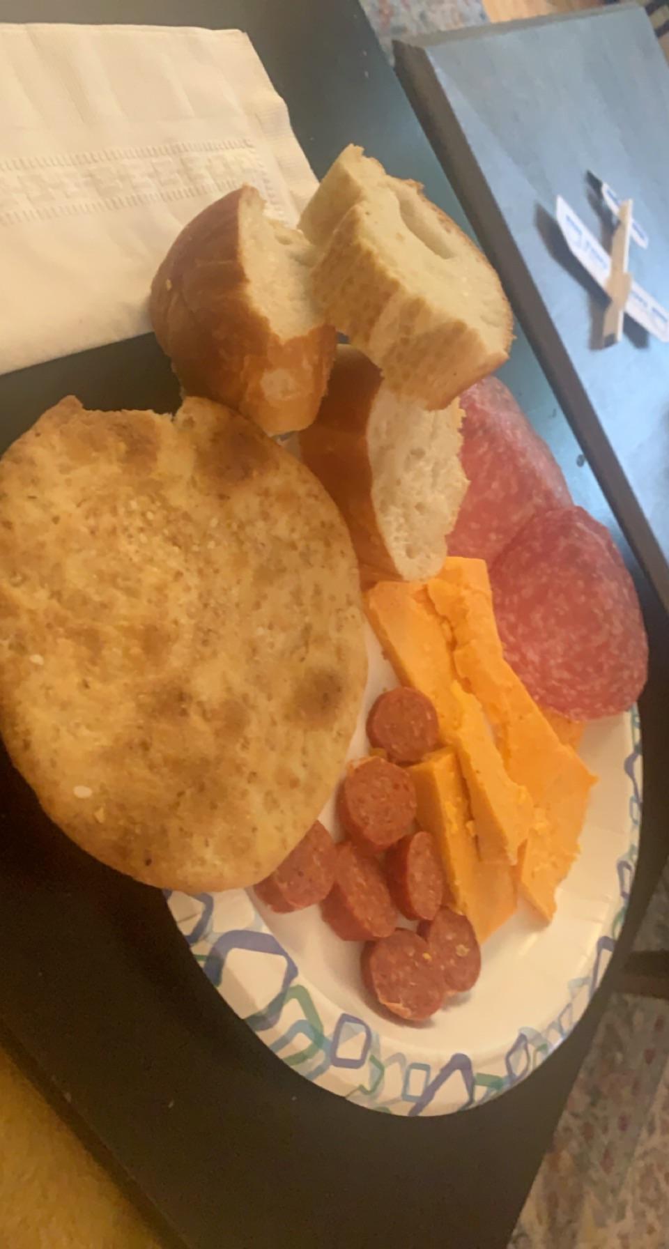 How many calories in this bread and cheese plate, about? caloriecount