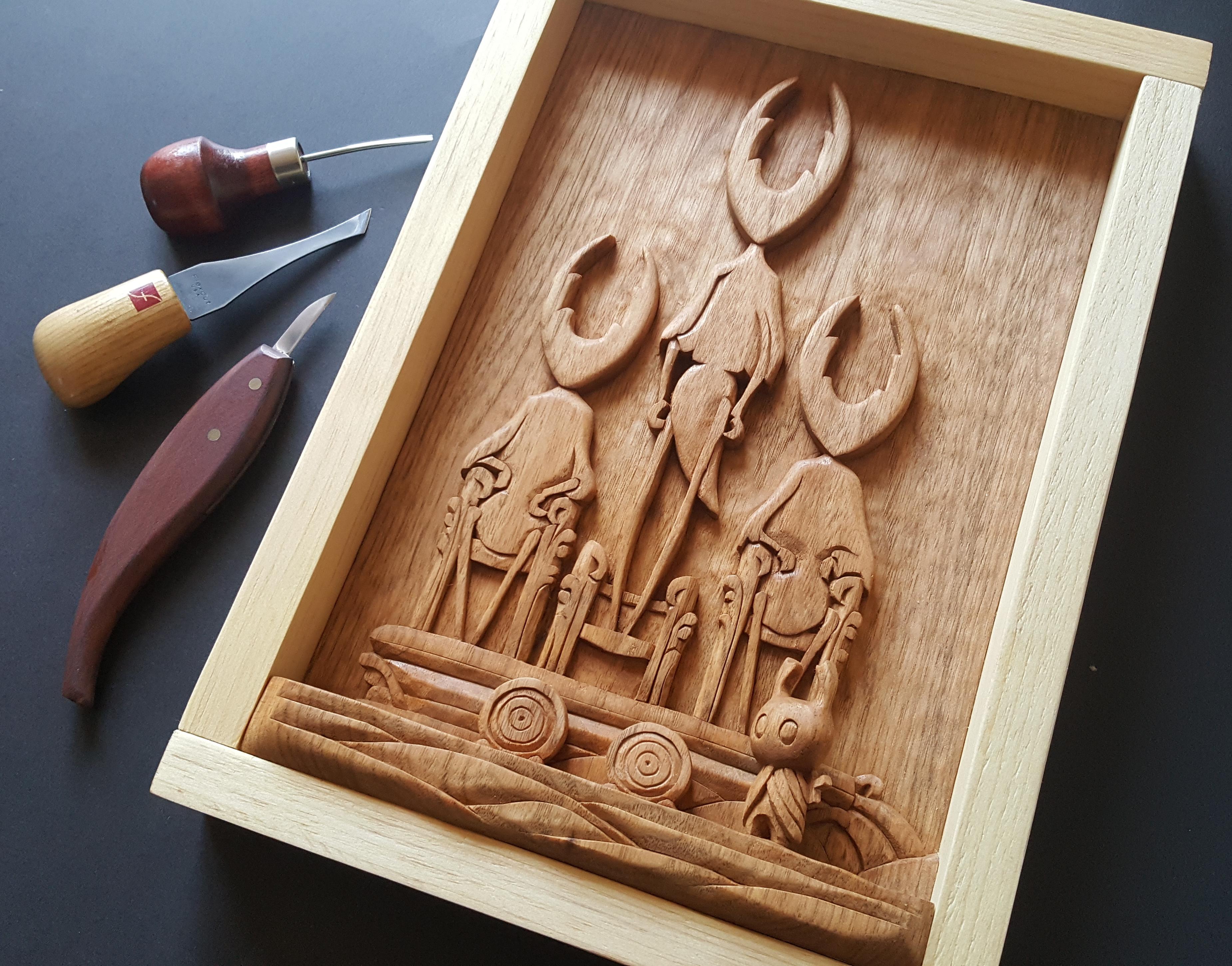 Relief carving in butternut wood a scene from the game Hollow Knight. An additional board is
