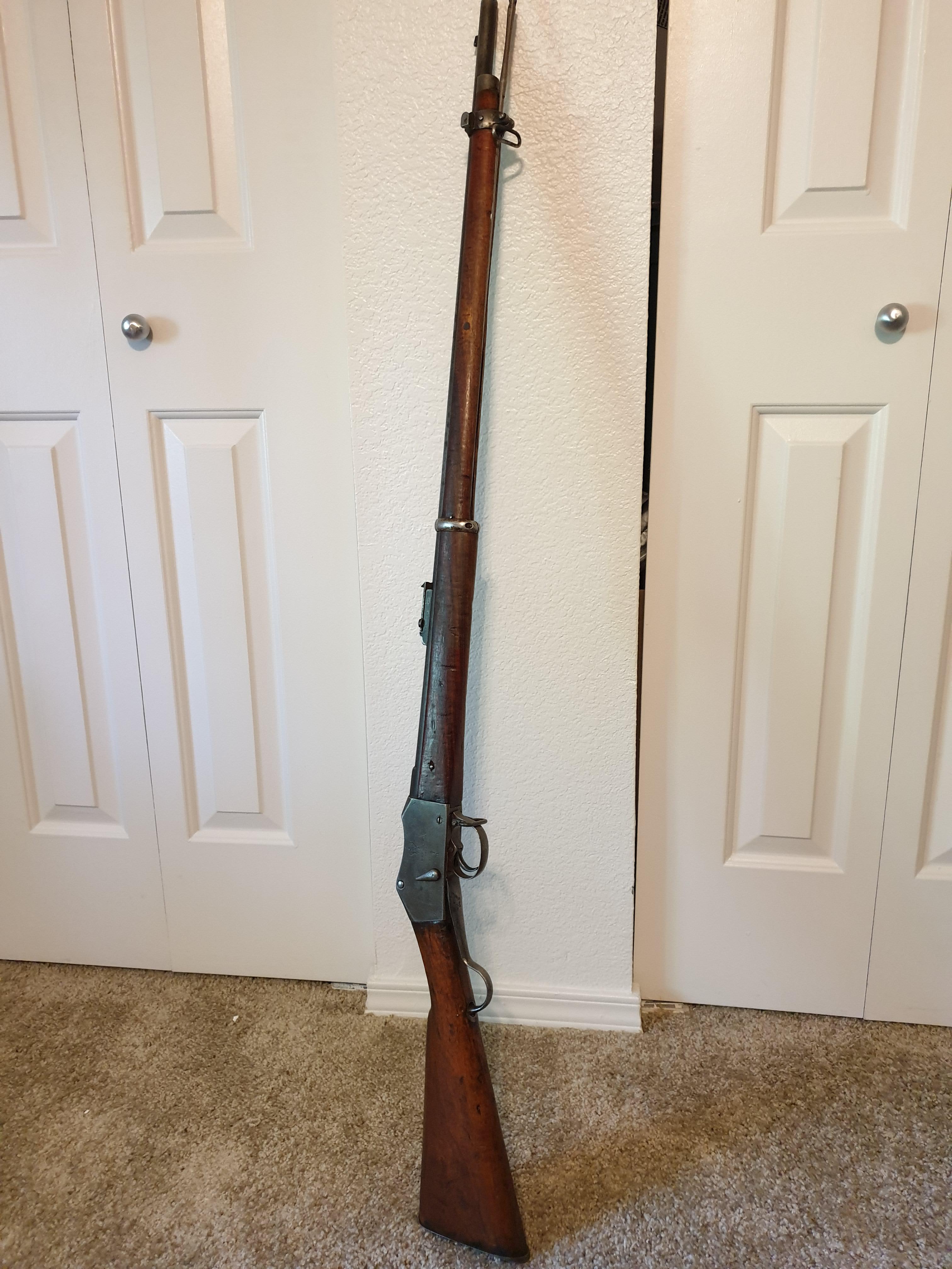Martini Enfield chambered in .450577. Stamped 1874. Still functions
