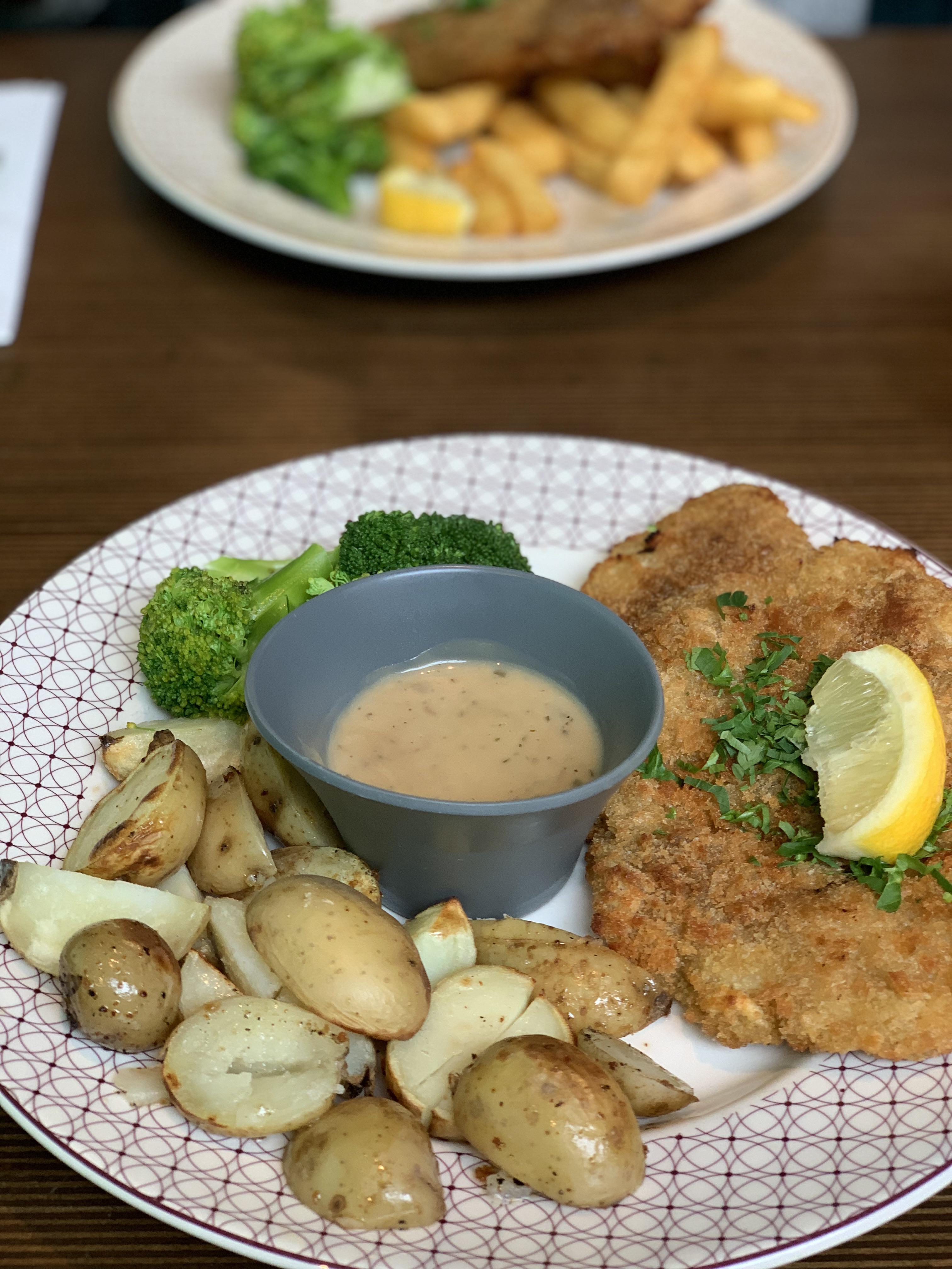Breaded butterfly chicken breast, seasoned and roasted. Served with