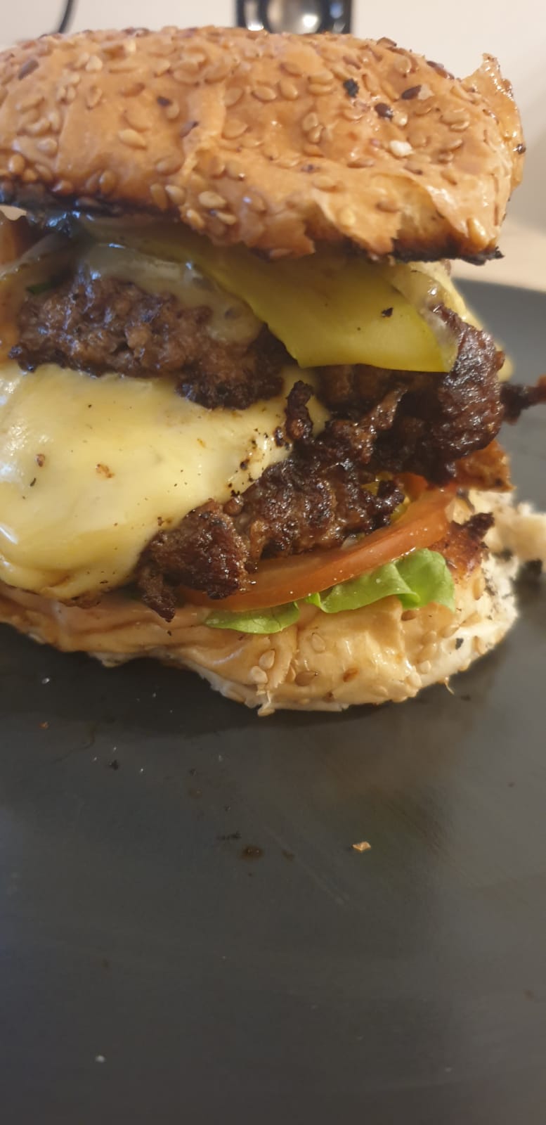 Double smash burger with killer sauce! Lettuce, Tomato slices, Dutch