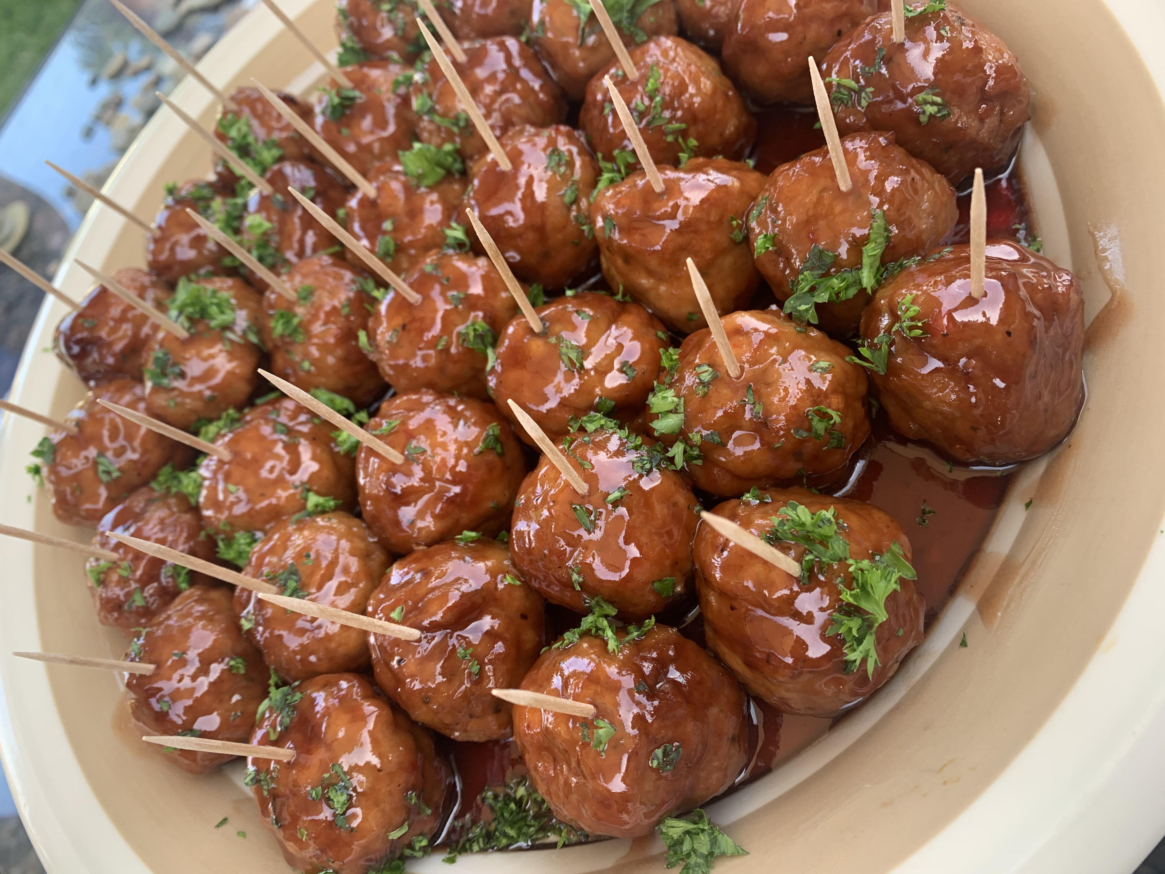 Honey BBQ meatballs with fresh parsley. Simple, yet a crowd pleaser