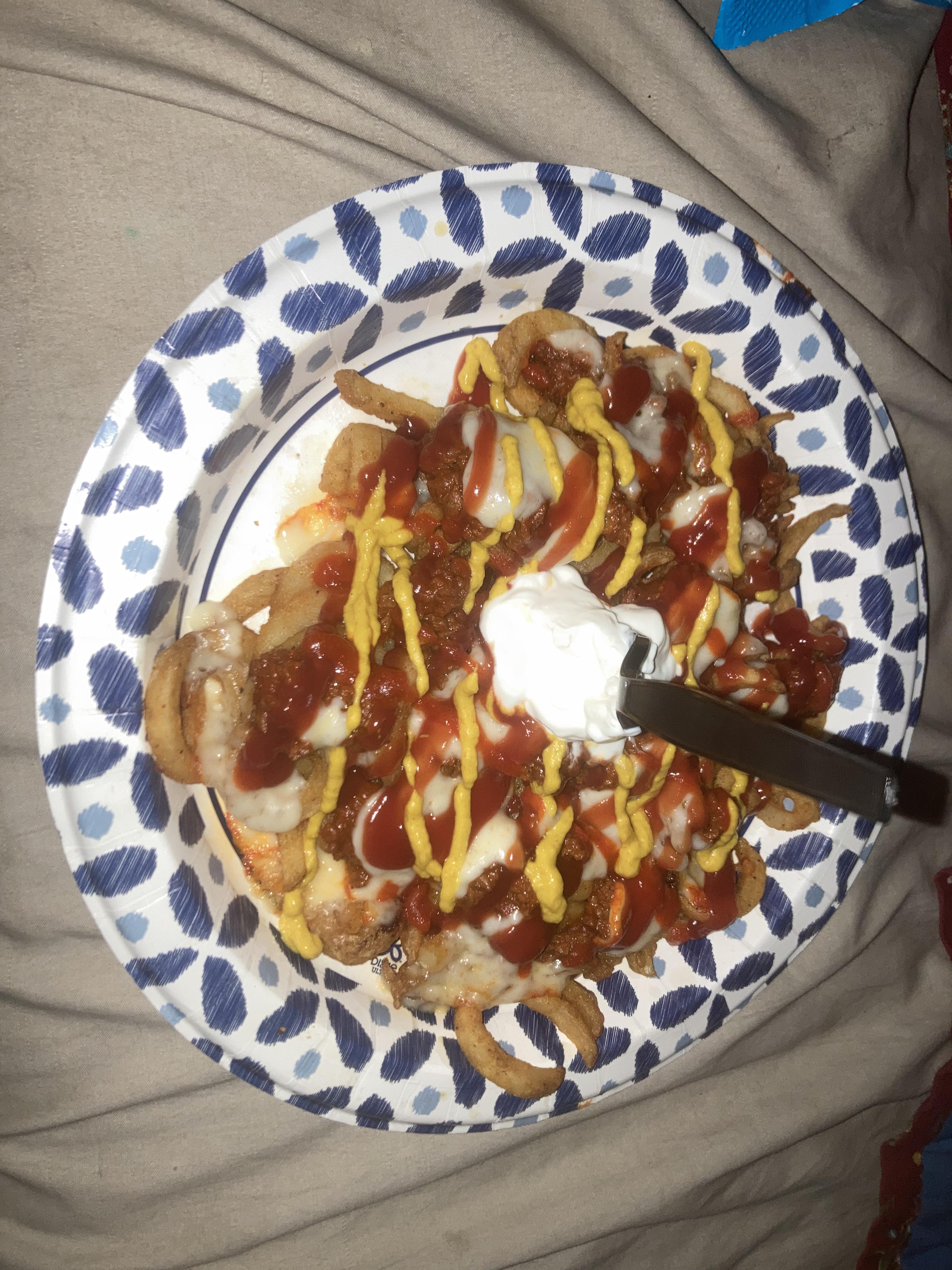 Ketchup mustard sriracha sauce fries with munster and chorizo r