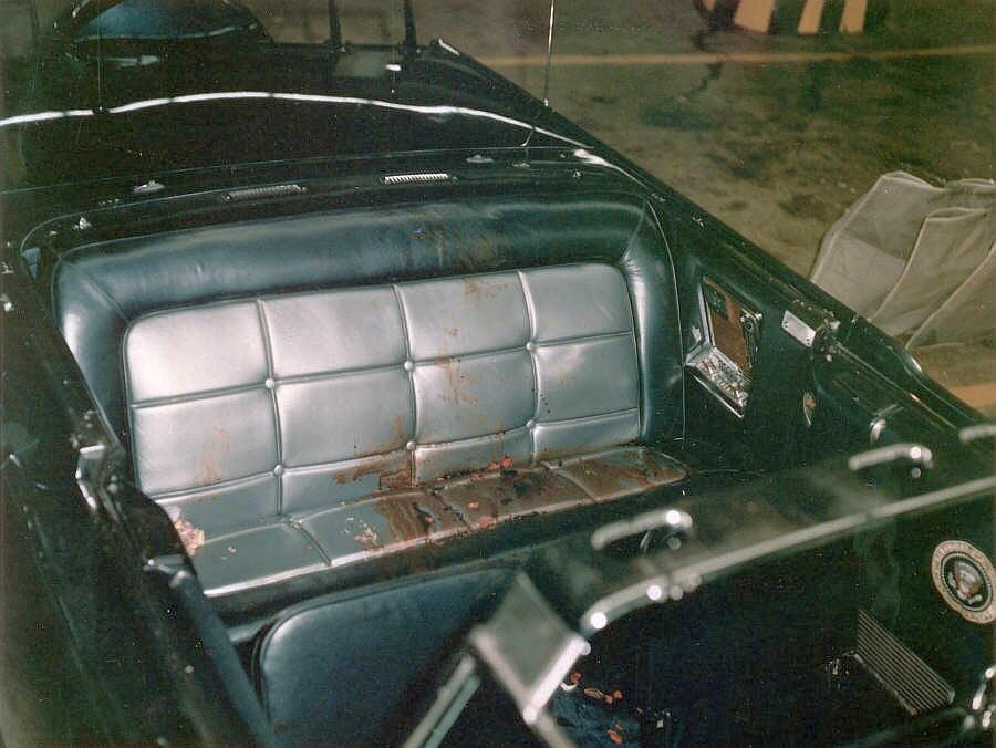 The rear seat of JFK’s limo right after the assassination and before