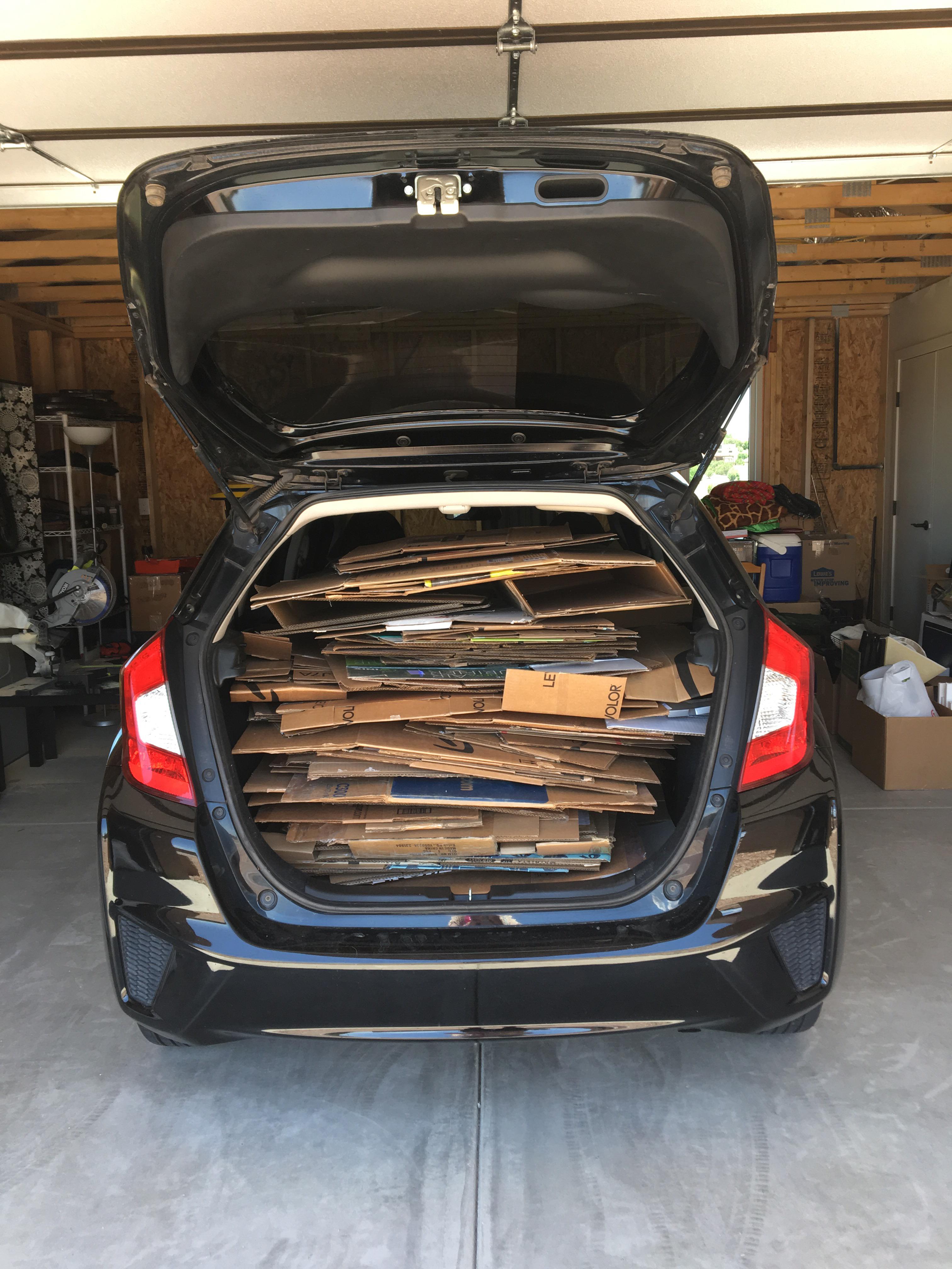 I hate moving house, but love how many flattened boxes I can fit in my car 🙌🏻 r/hondafit