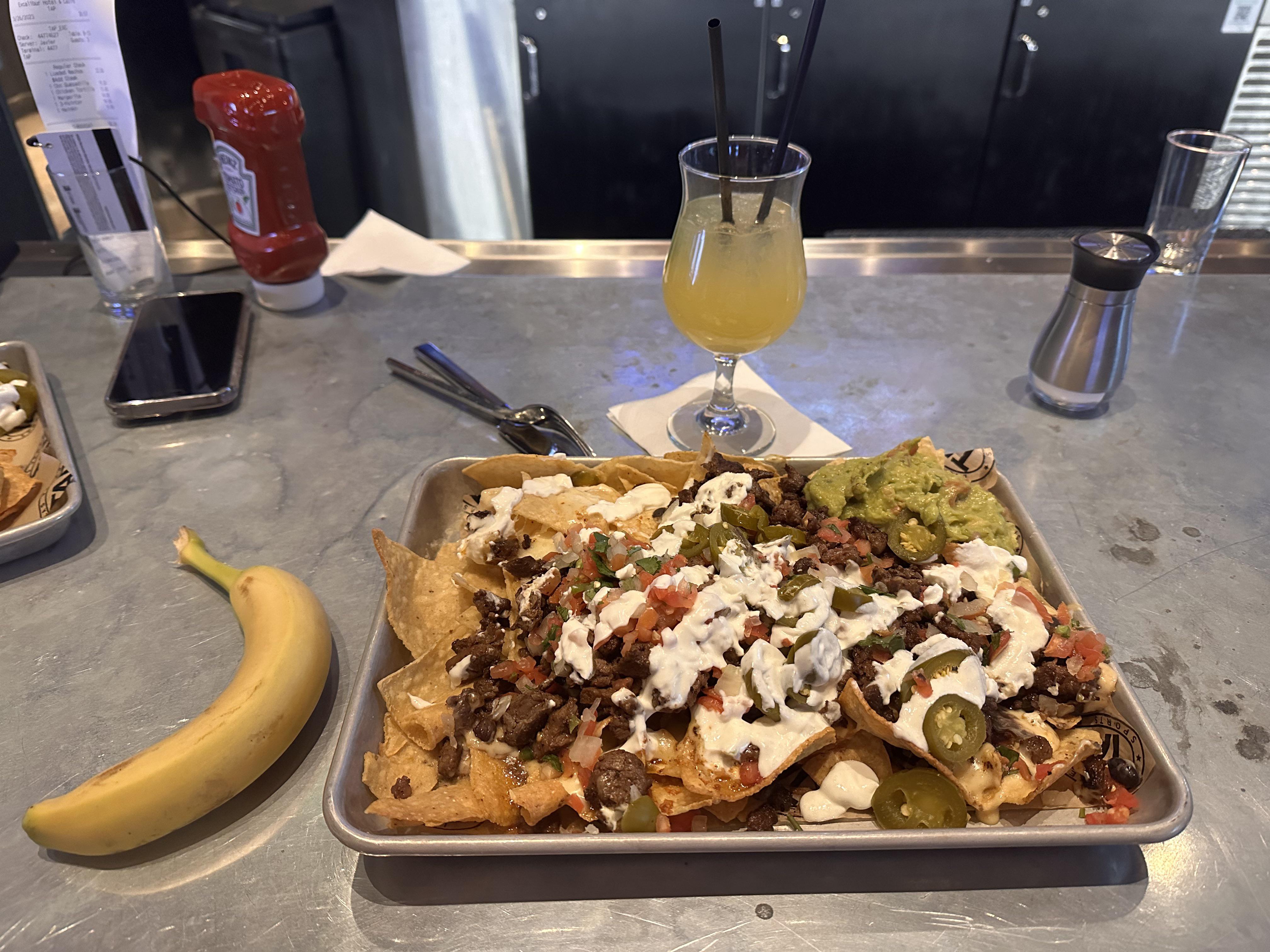 My ‘snack’ sized nachos at TAP sports bar, Excalibur, Las Vegas. Banana