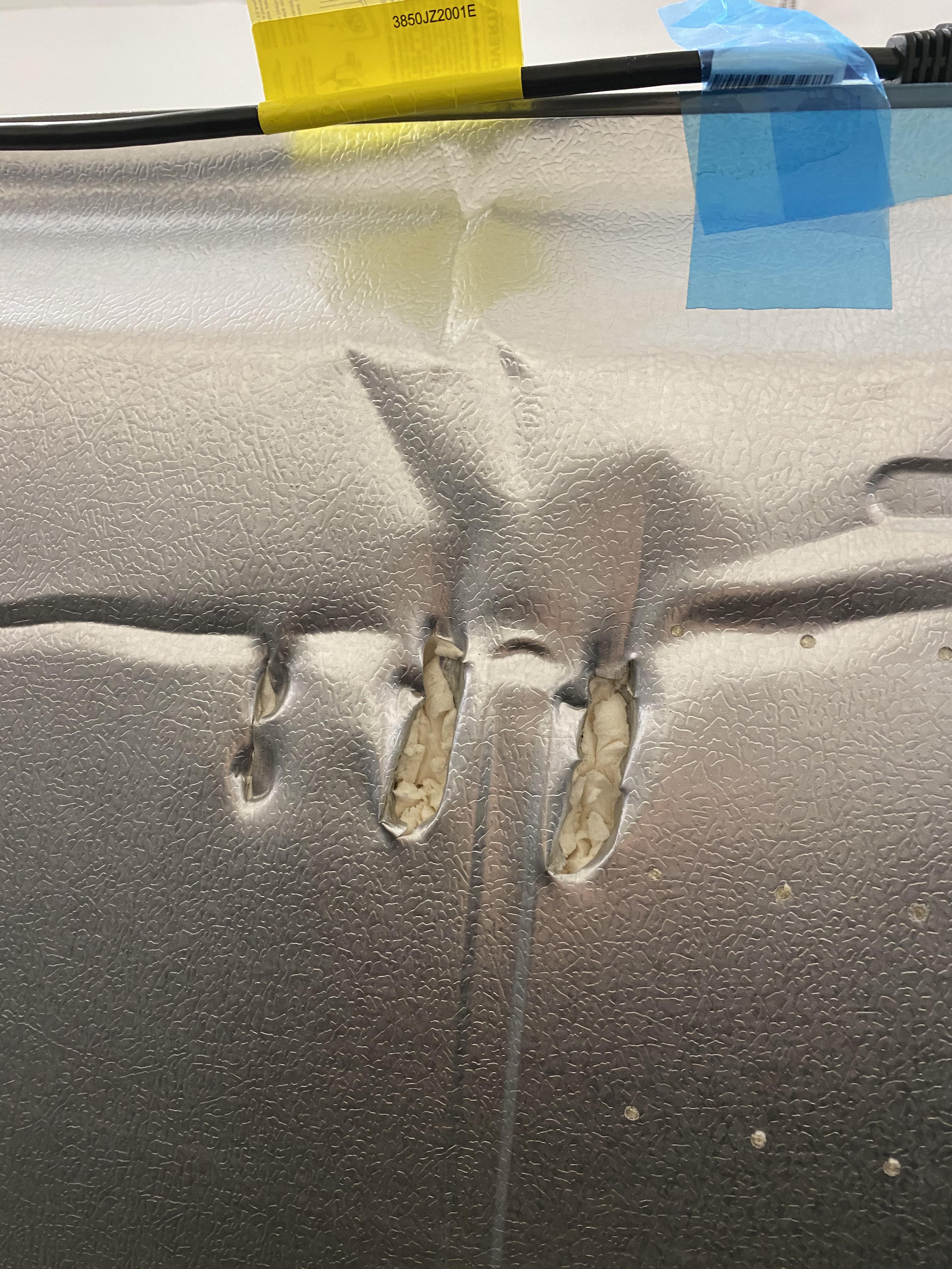 Found this “dented” refrigerator for a great deal. It comes with a 1