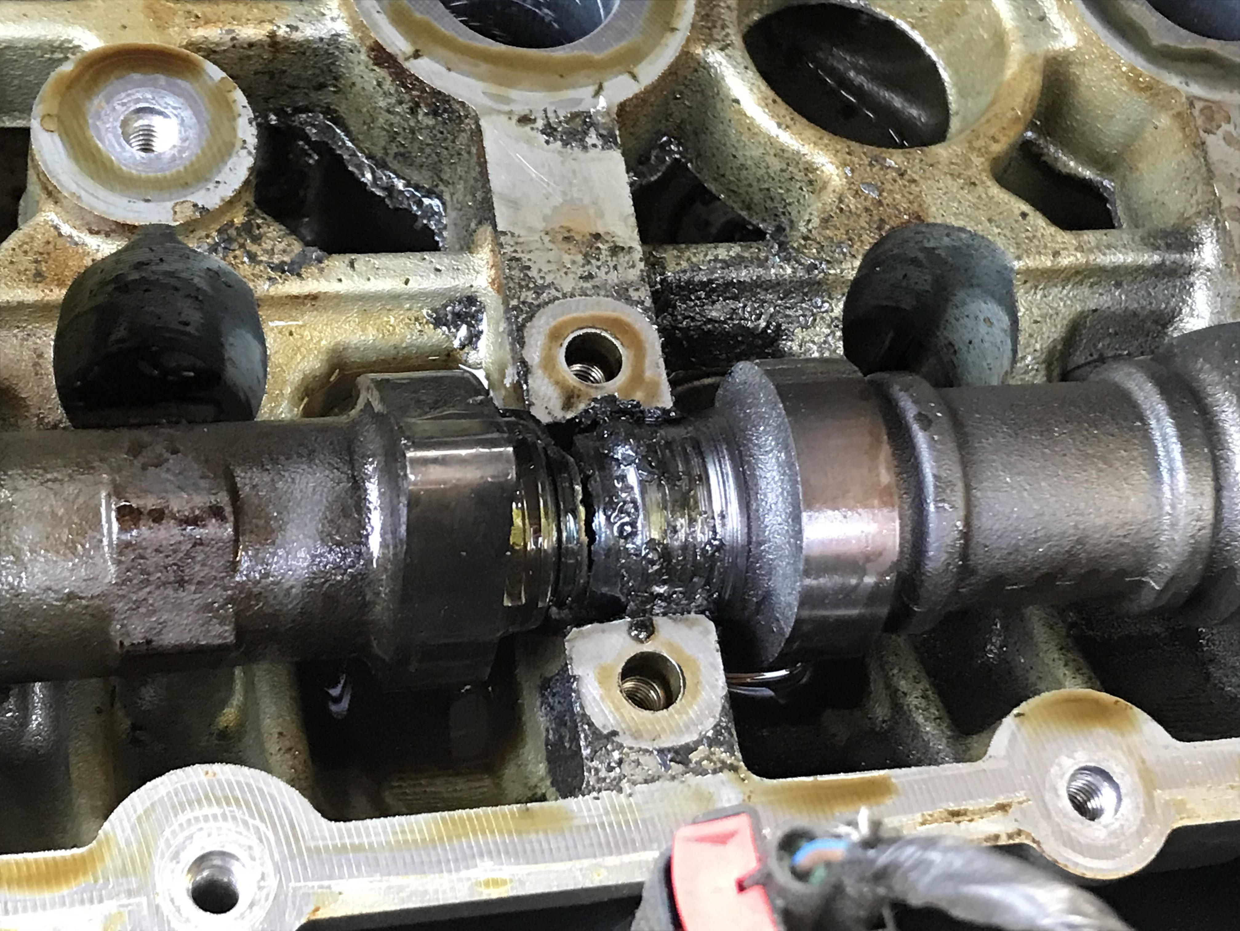 Pinhole rusted through oil pan caused engine to run out of oil. Intake
