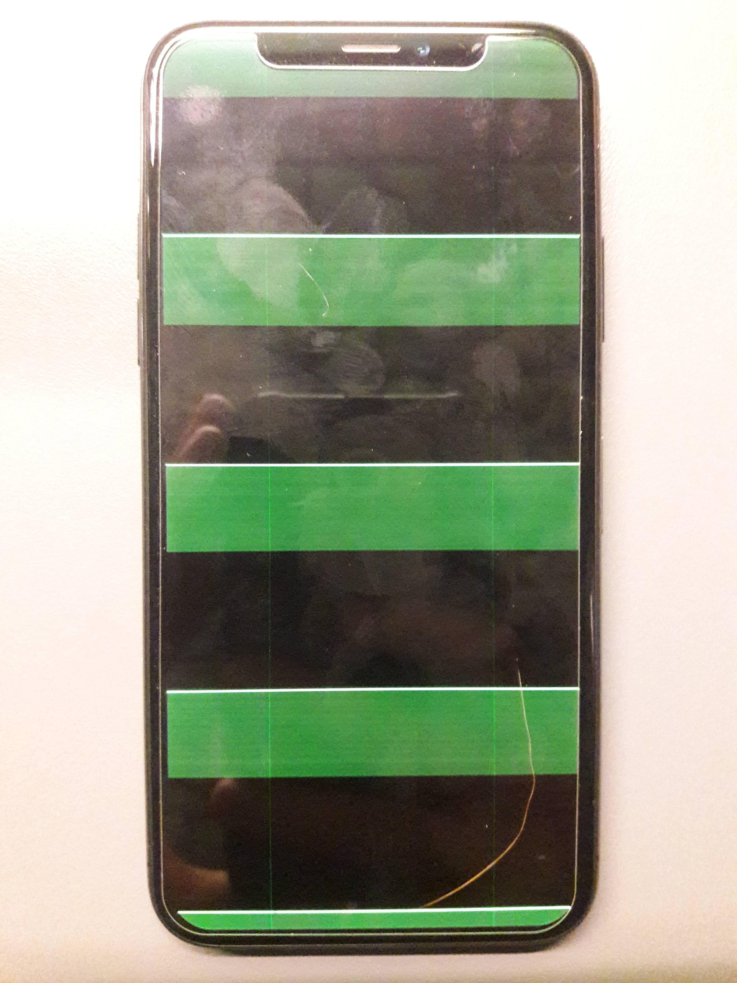 iPhone X screen just flashes white instead of turning on. This happens