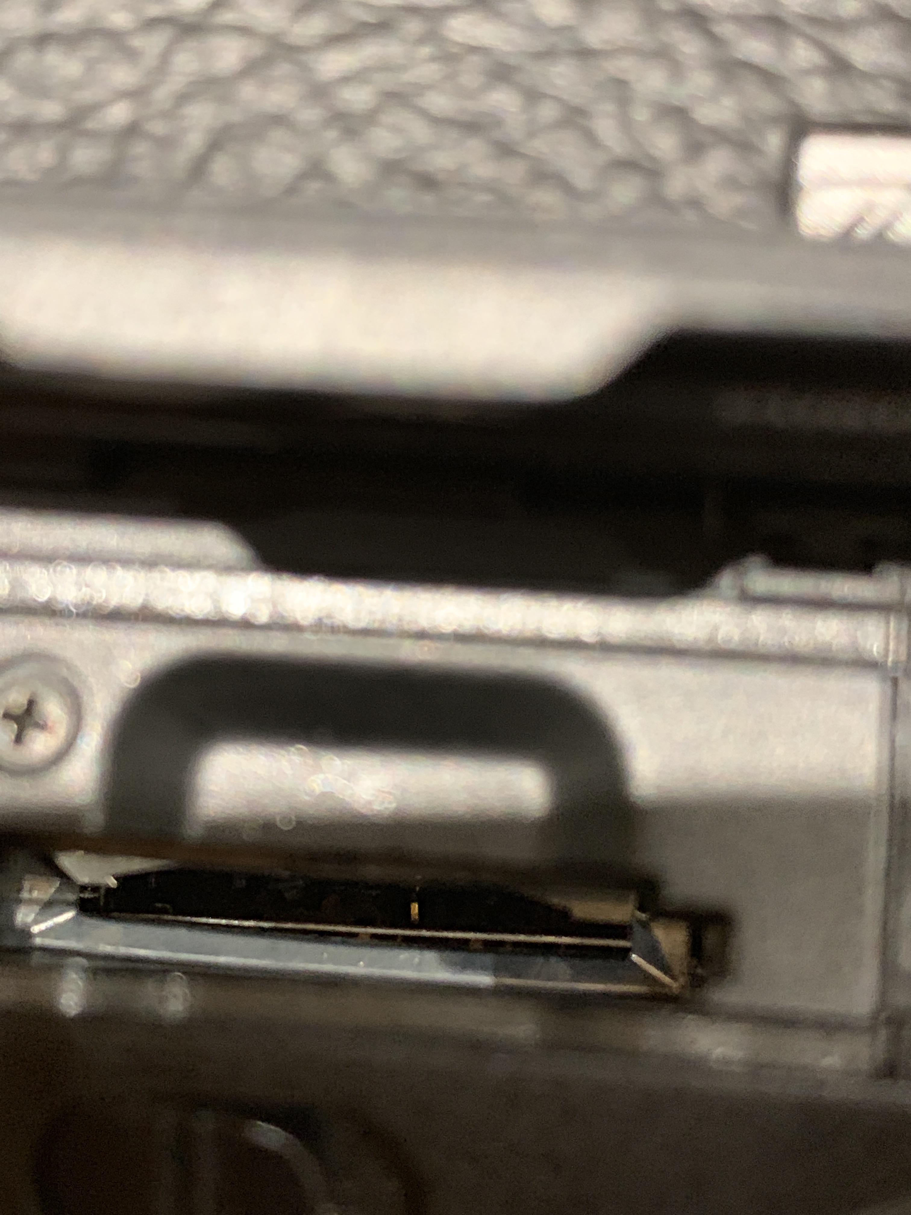 Went to eject a memory card from Slot 2 on my A7III, now card won’t go