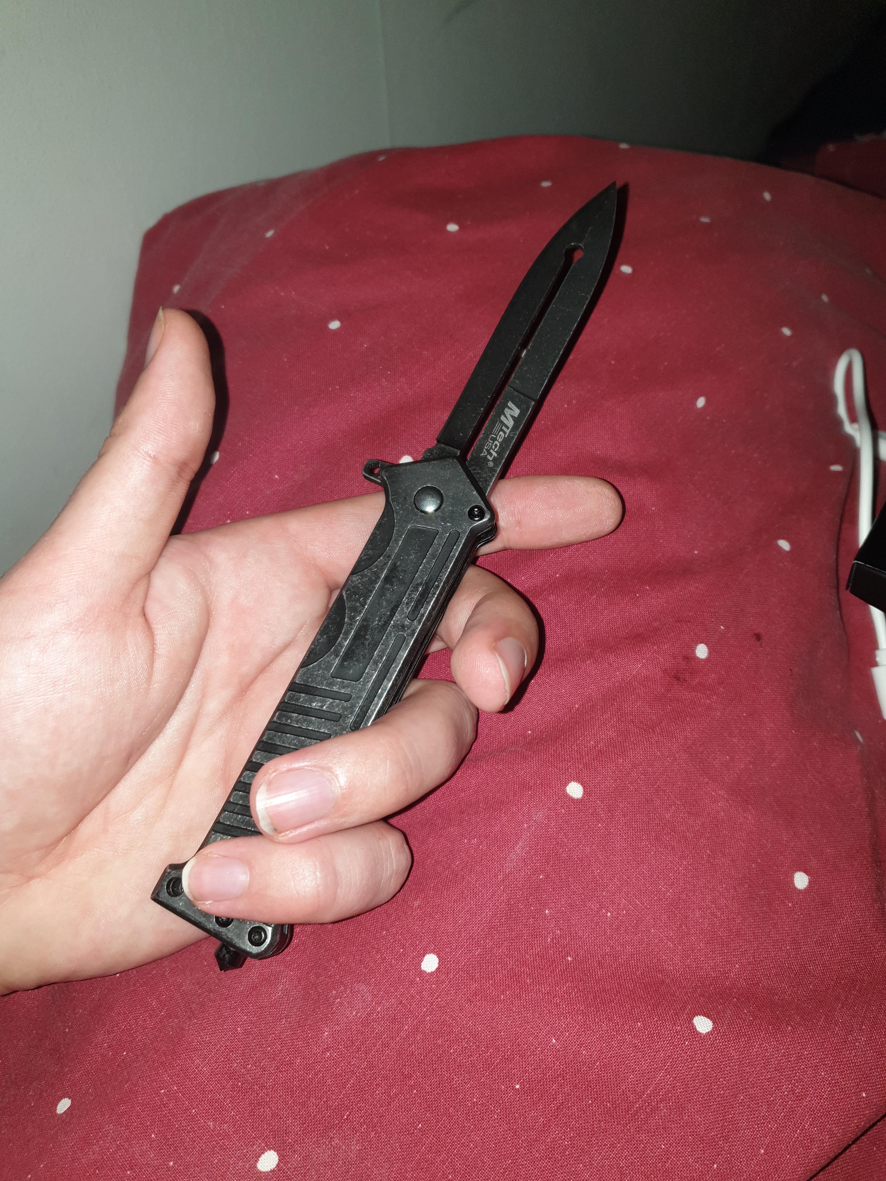 Mtech's Joker knife. Like the feel, look and springassisted flip. Could do some dmg to normies