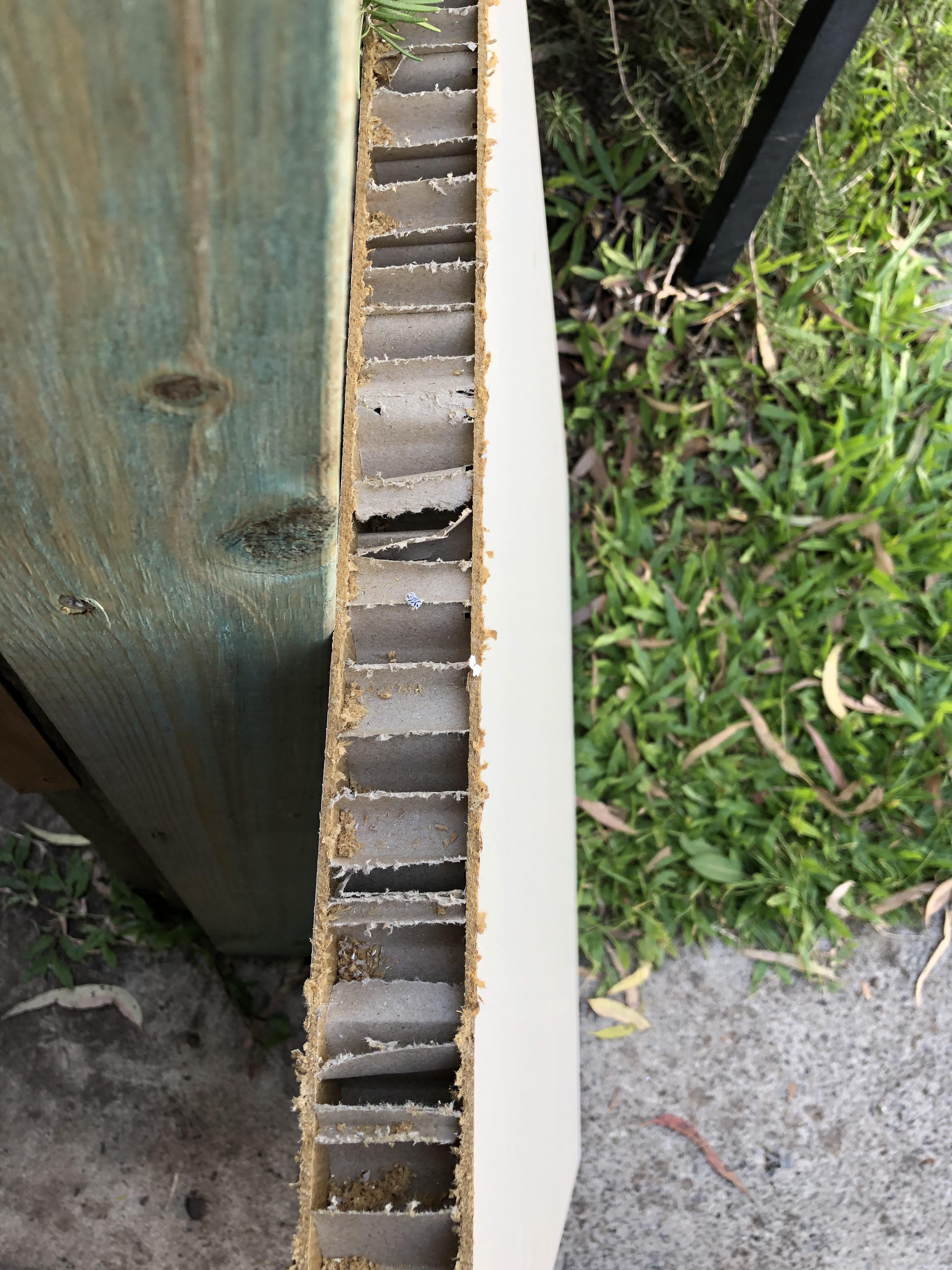 Cut an IKEA bed frame in half. It’s two thin sheets of Plywood attached