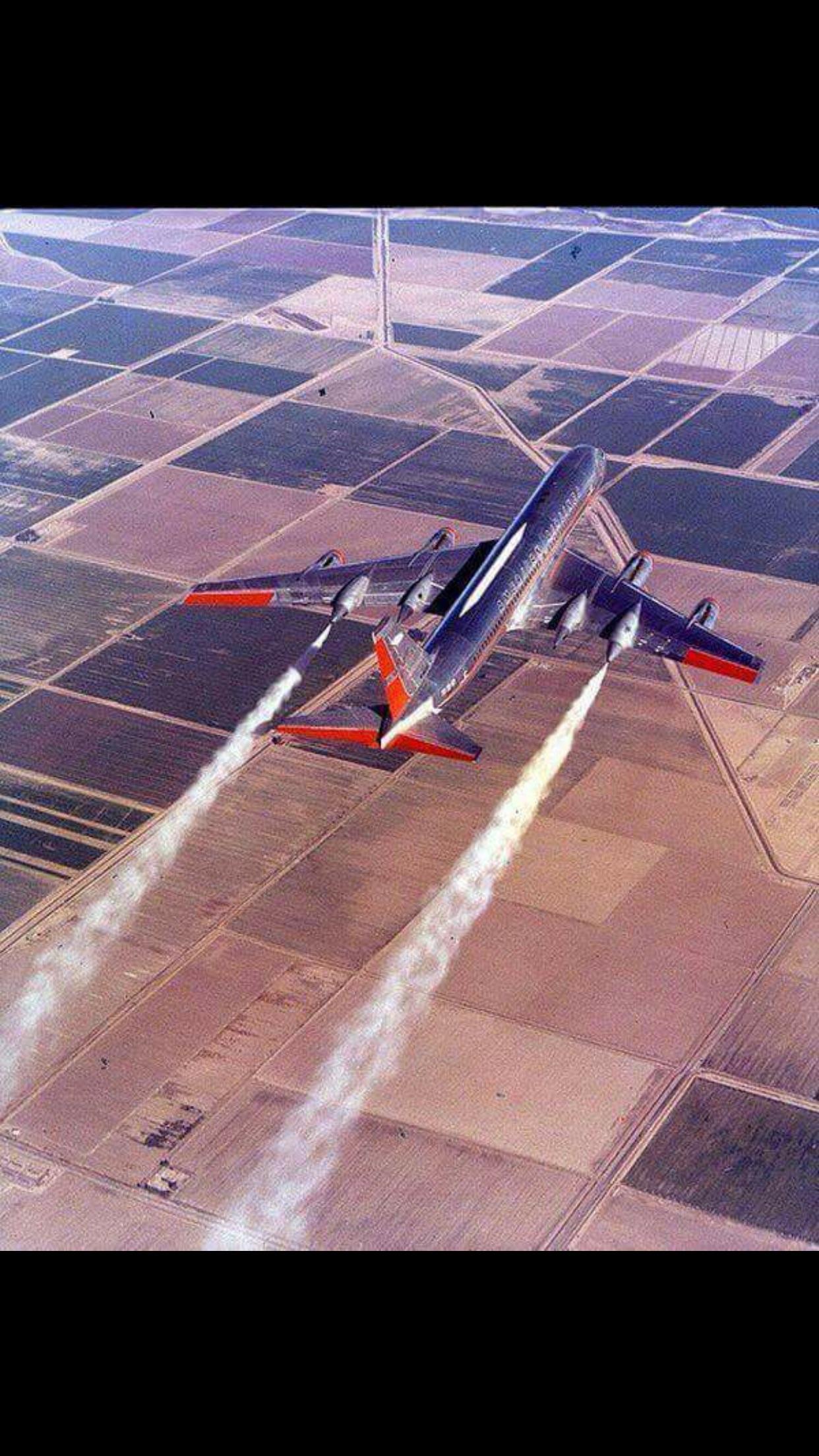 The Convair 990 testing its emergency fuel dump system circa 1960