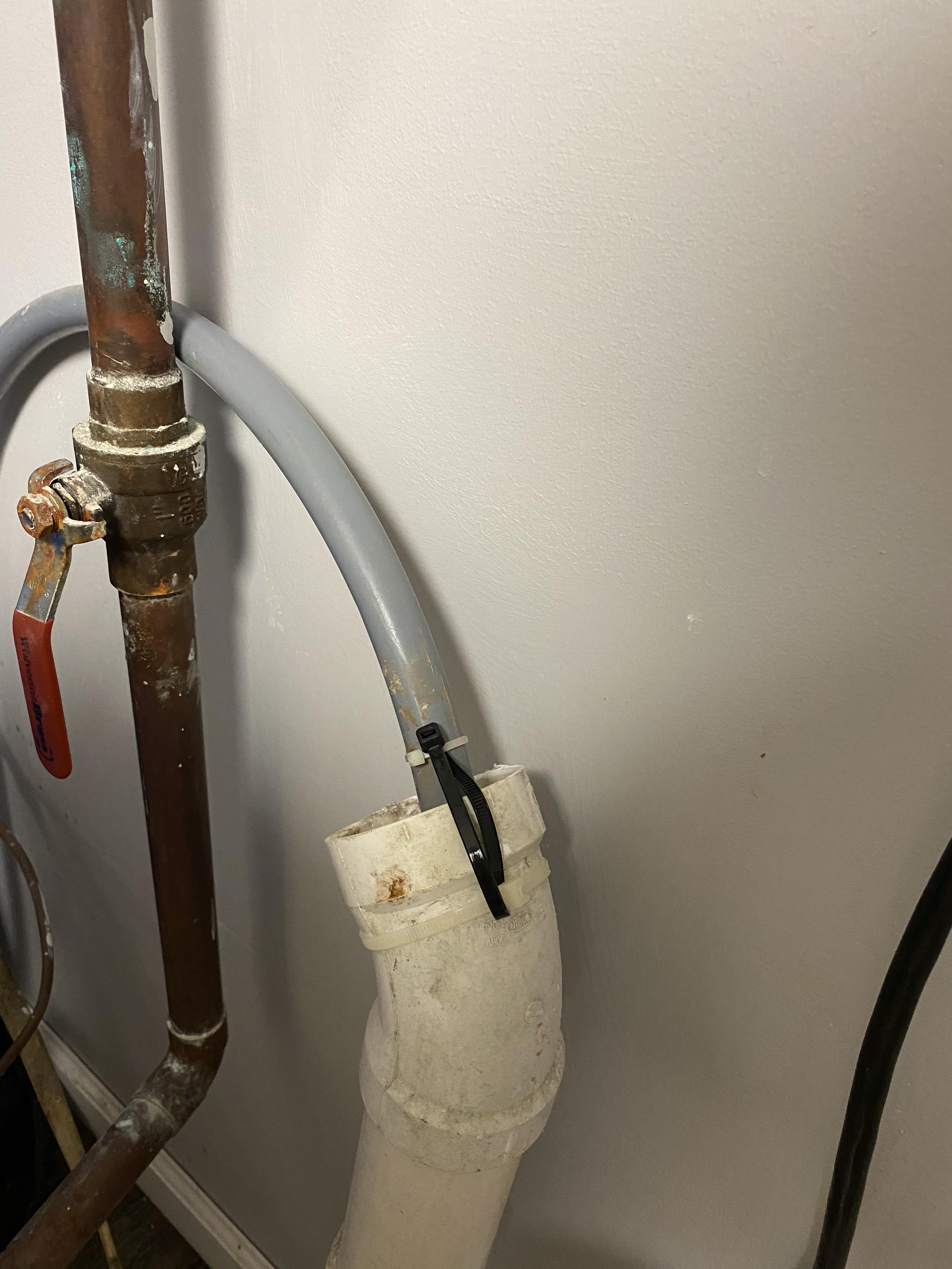 Water softener discharge line came out last night and made a mess on