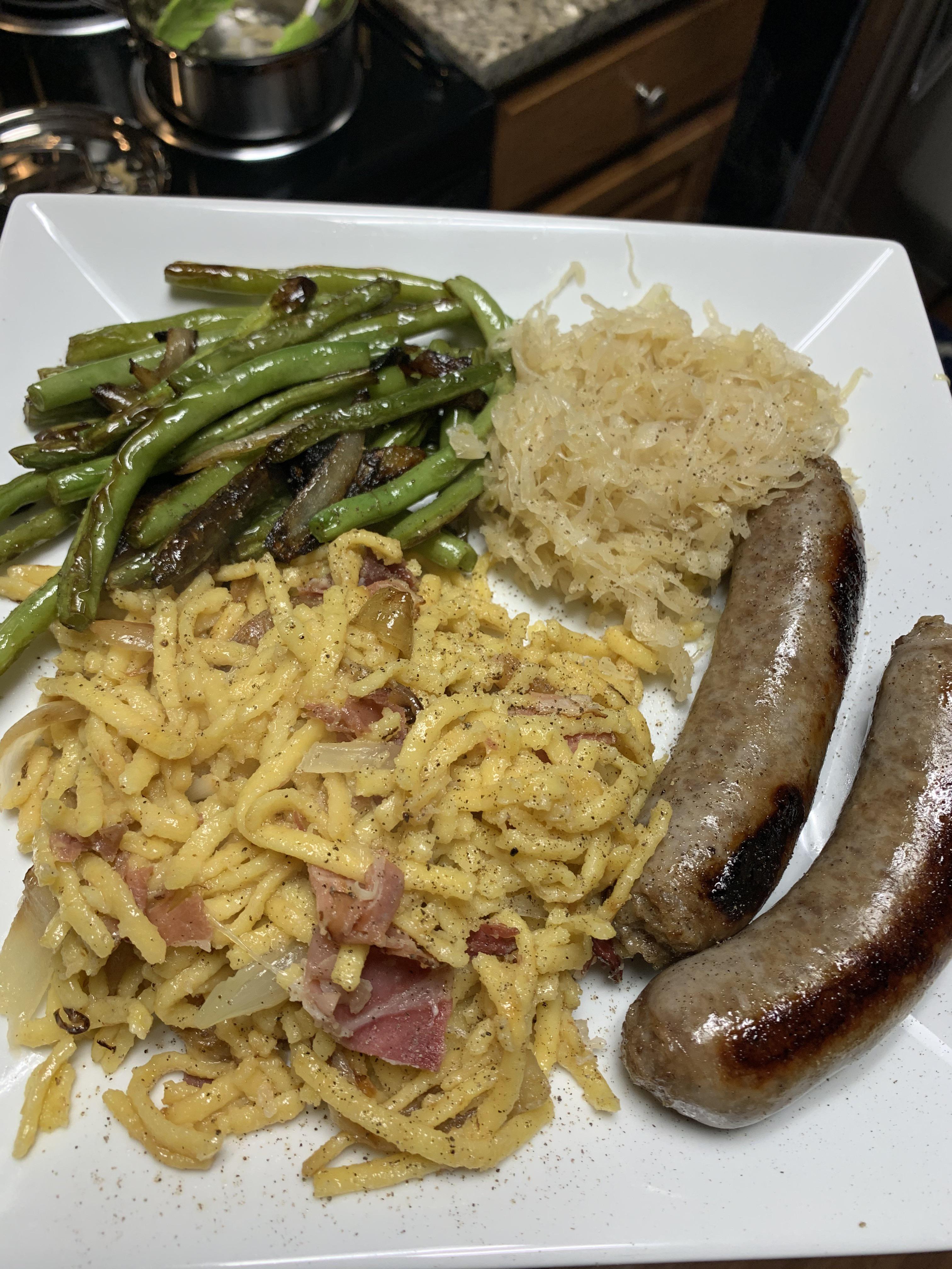 My Germaninspired dinner bratwurst, sauerkraut, fresh sautéed green