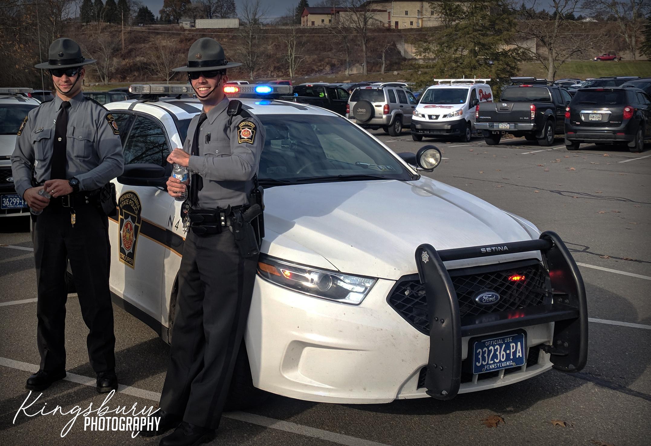 [OC]Pennsylvania State Trooper leaning against his Patrol Unit