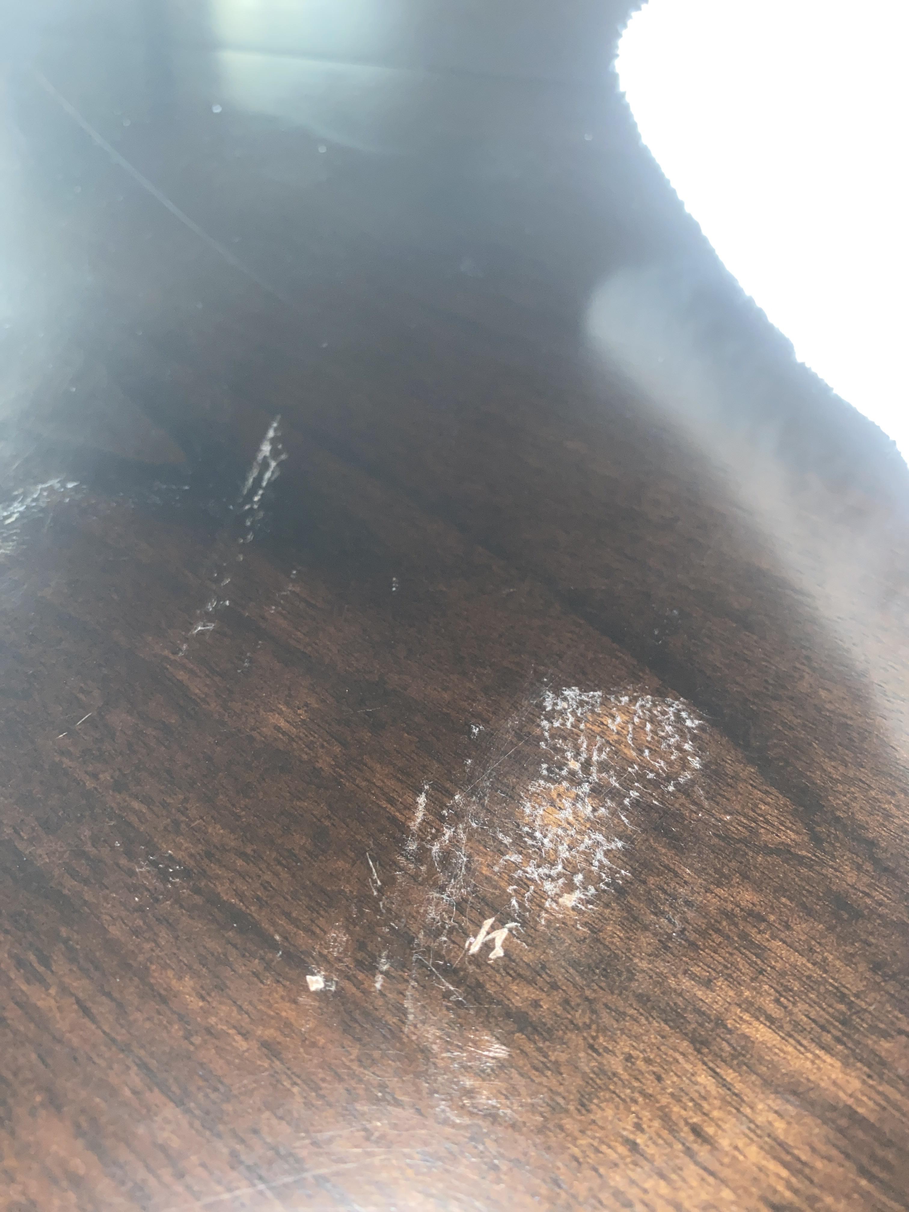 spilled acetone on a towel that seeped through and got onto the wood