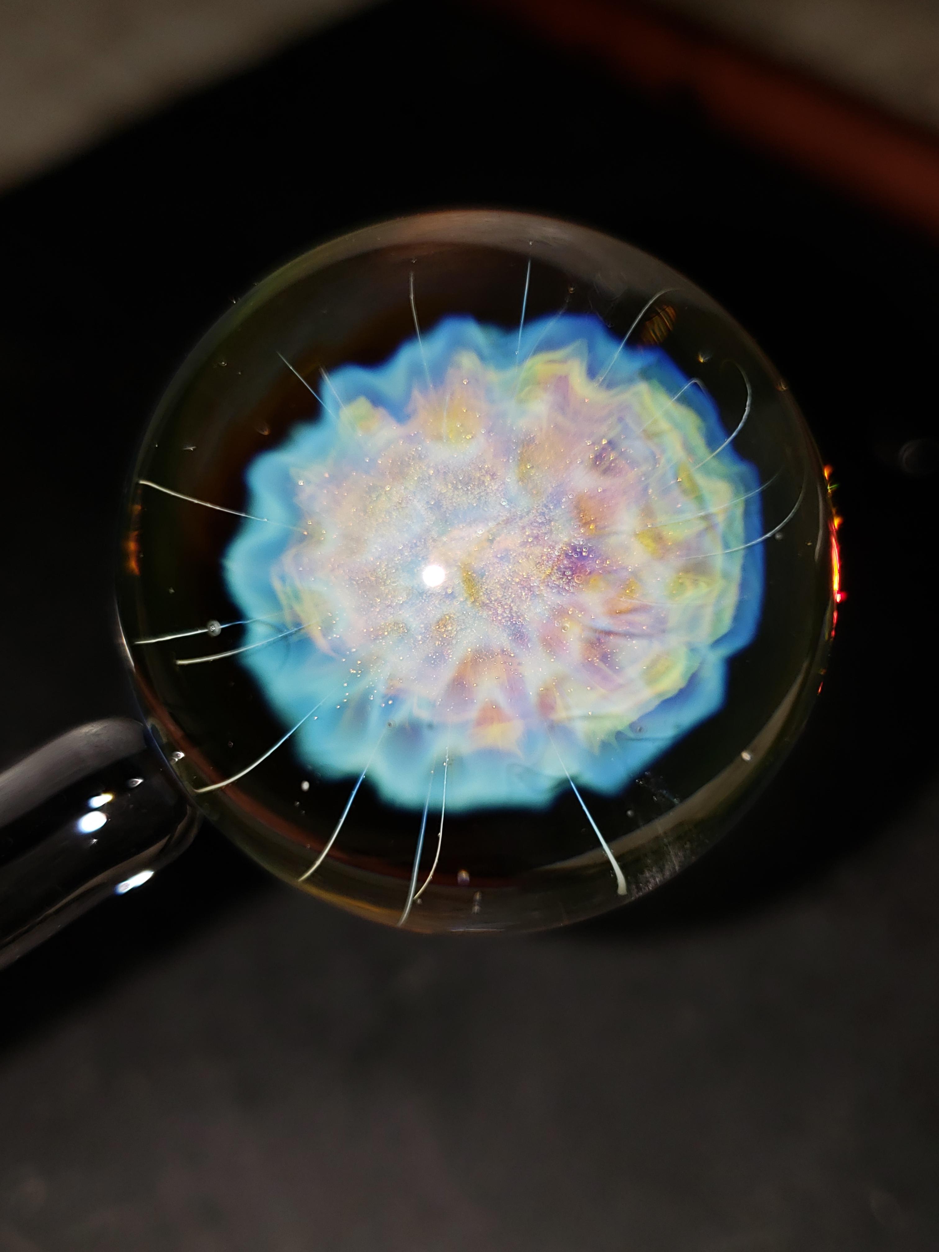 Silver vaporized and imploded in glass. r/pics