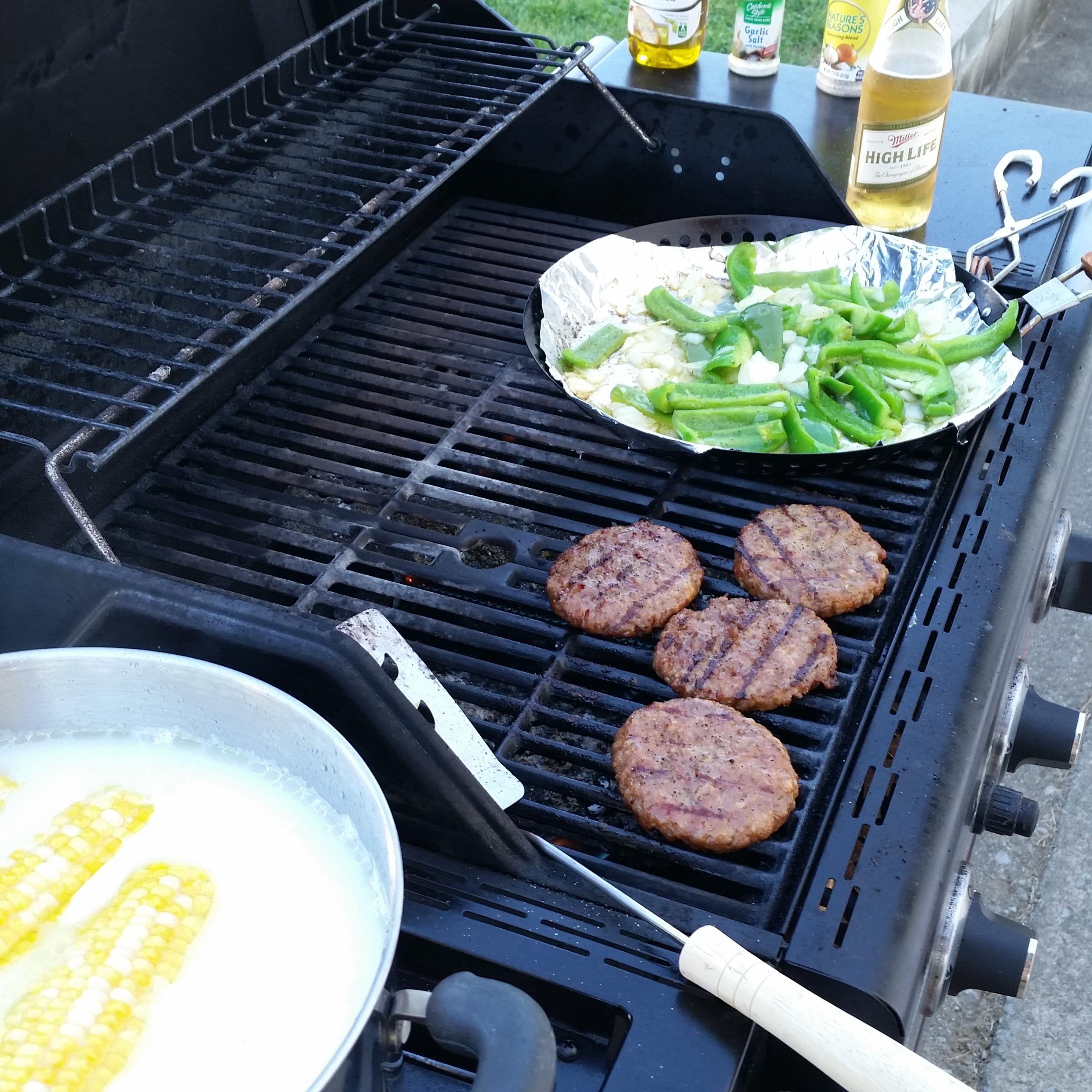 ON THE GRILL...sweet Italian sausage patties, peppers, onions and corn