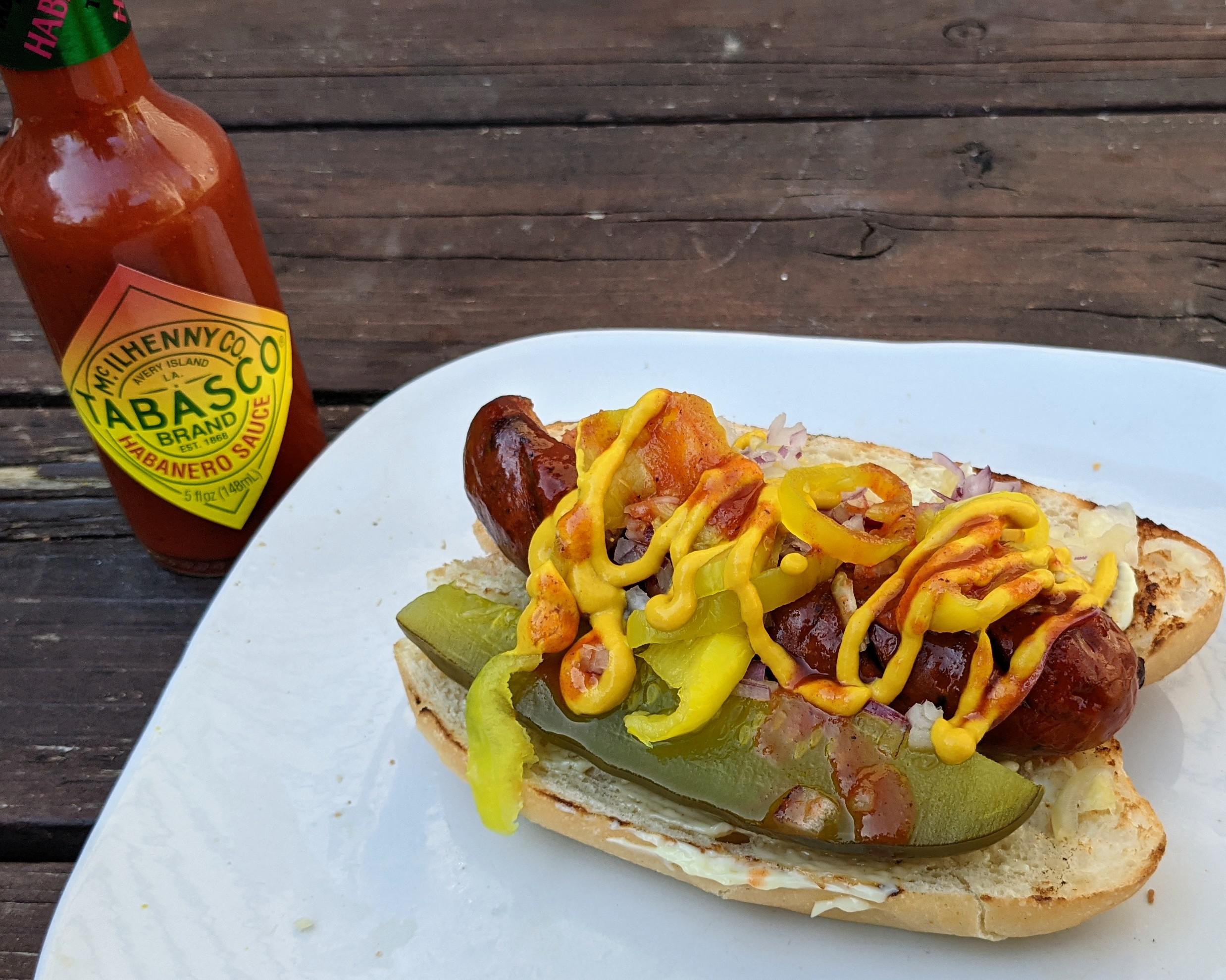 Andouille dog with banana peppers, red onion, dill pickle, mayo