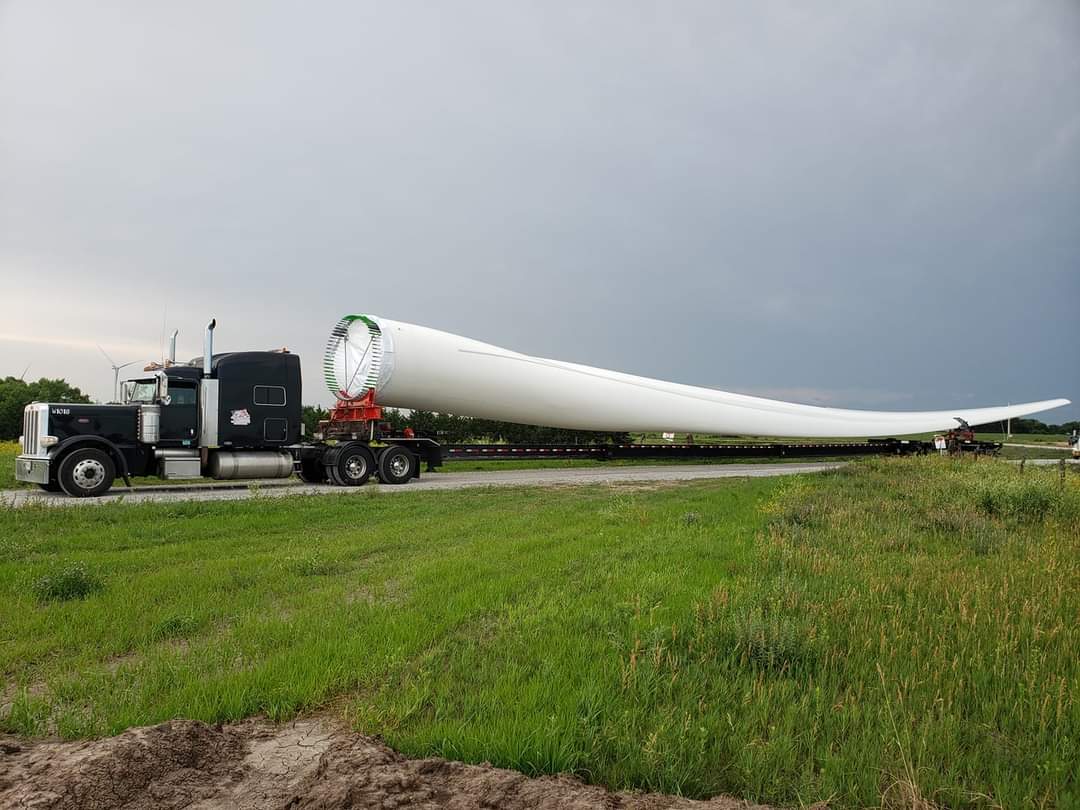 I haul the windmill blades for electric wind turbines.
