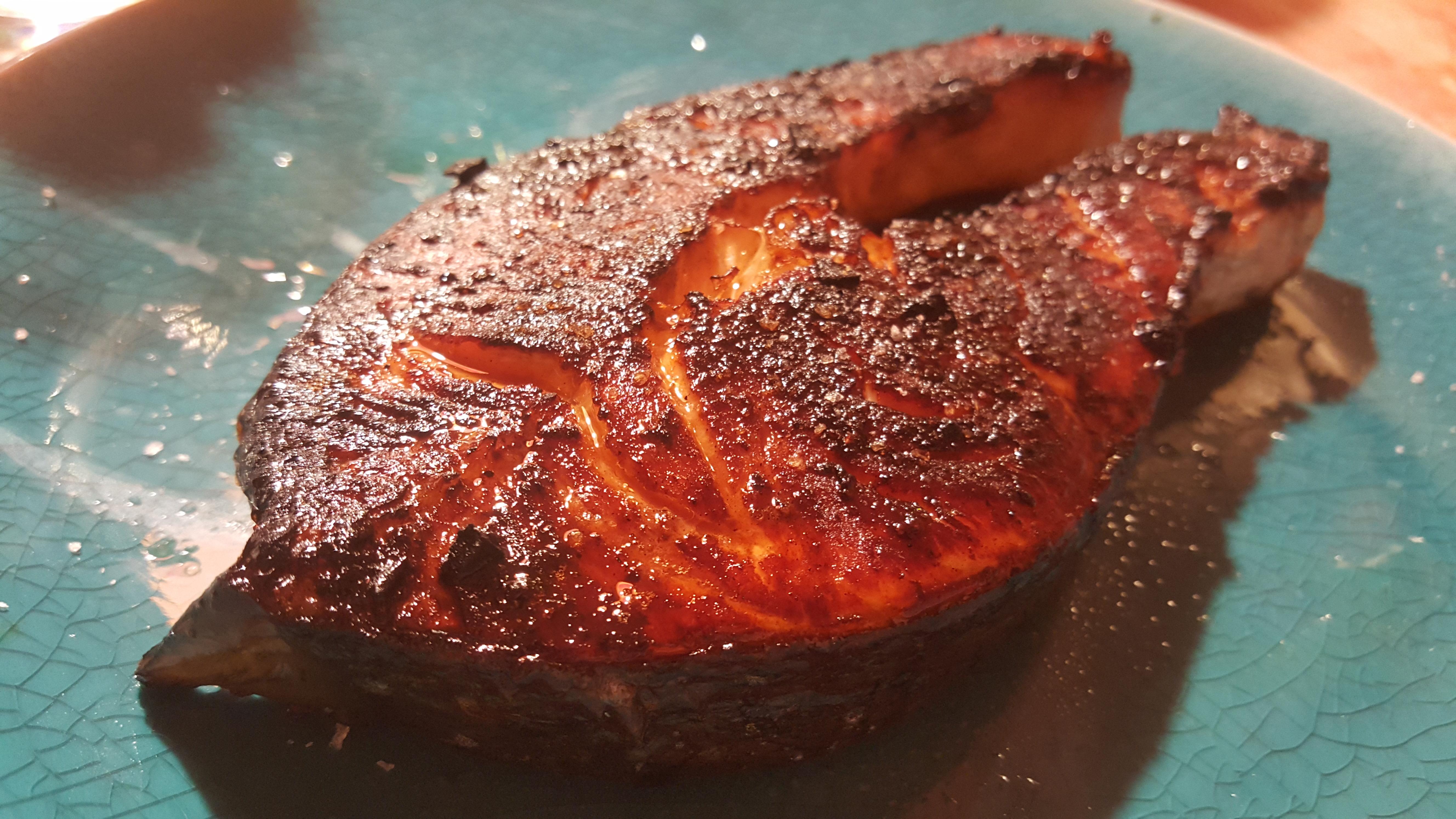 [Homemade] Honey glazed salmon steak on cast iron skillet r/food