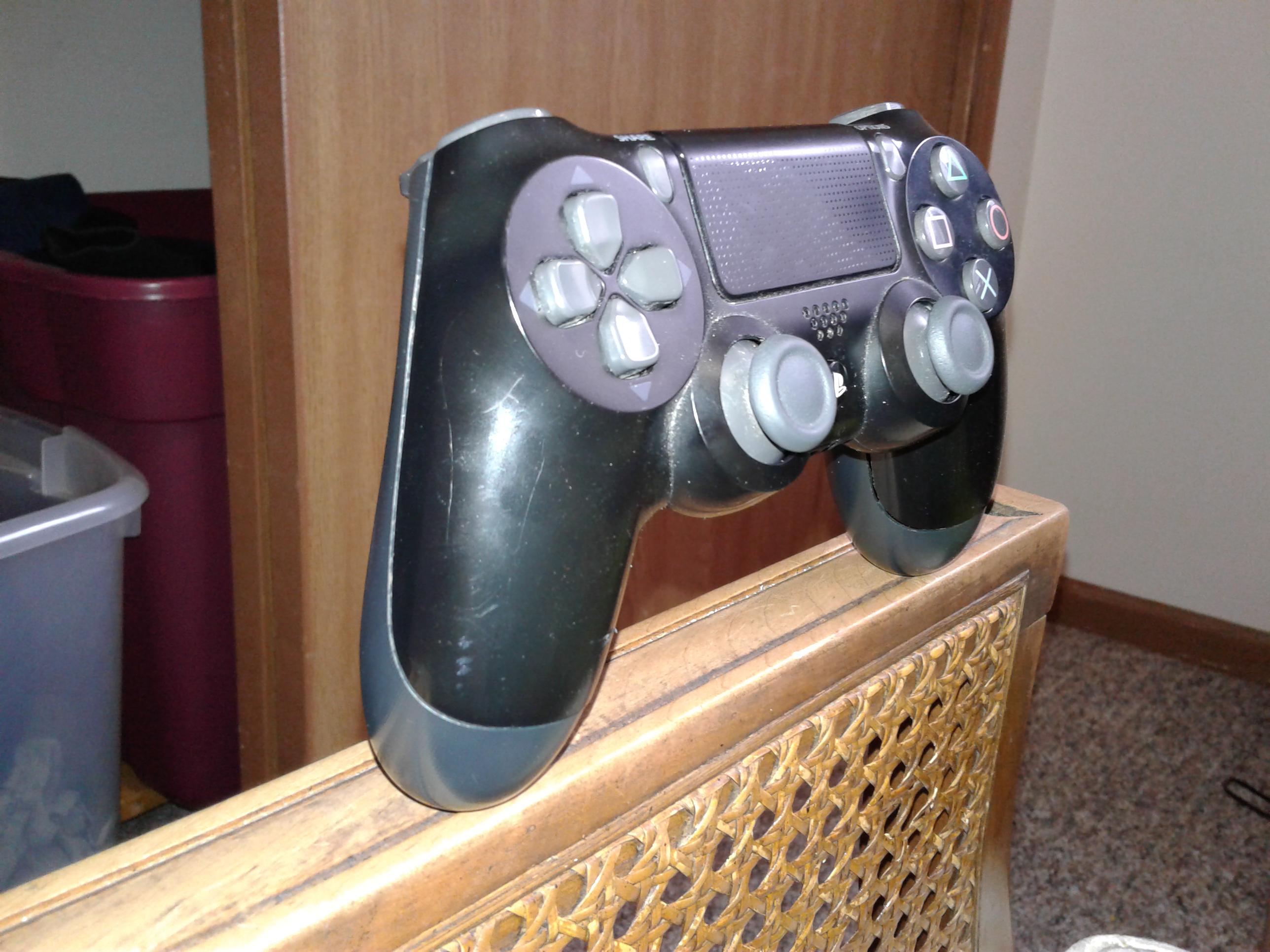Just found out my gaming arm chair is a perfect stand for my PS4