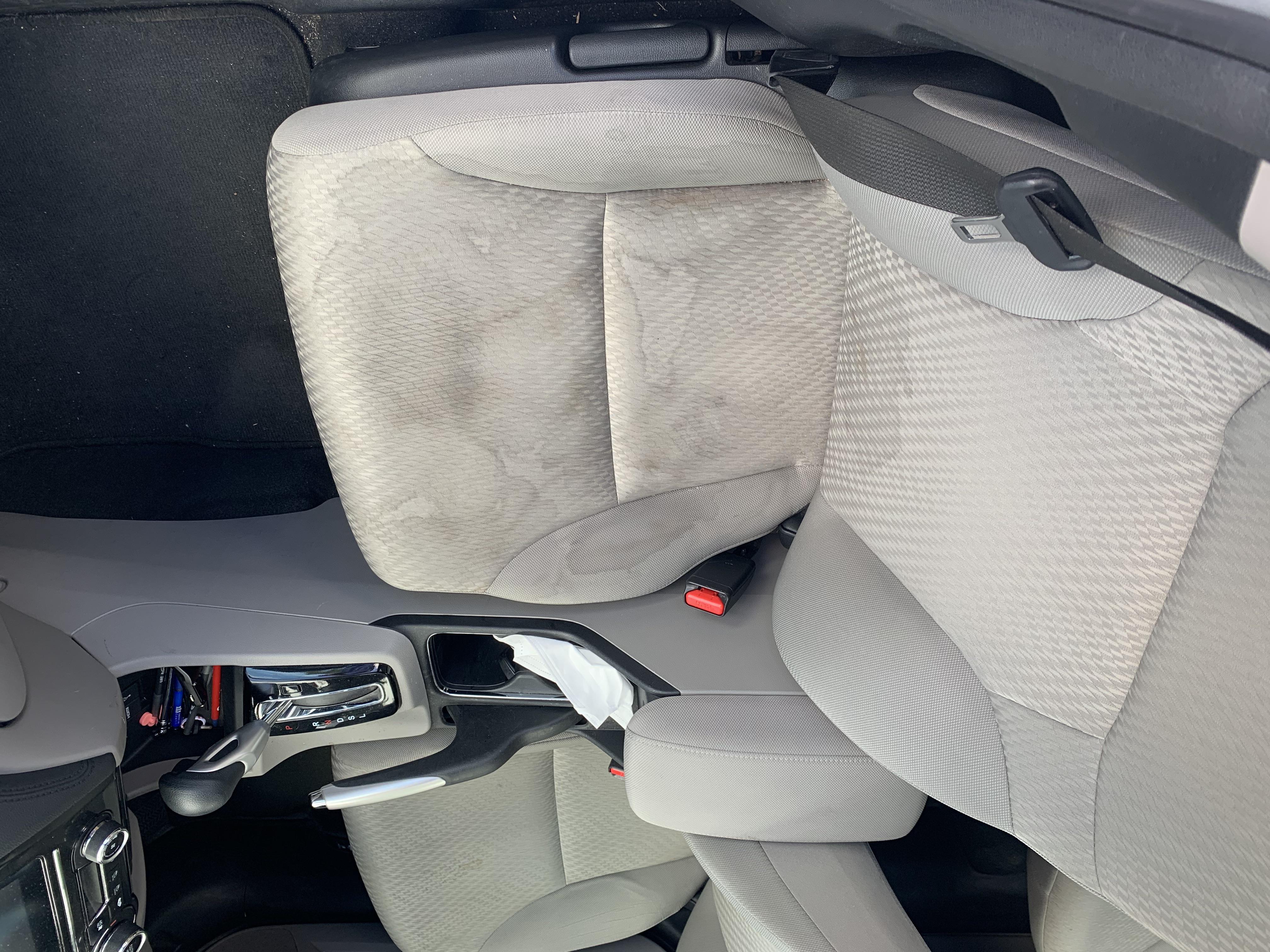 Stain on my car seat. How to fix this? Tried to use some interior