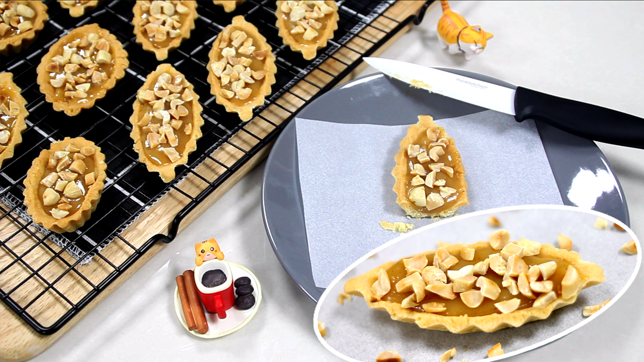 Yema Tart is a creamy condensed milk custard filling in a crumbly