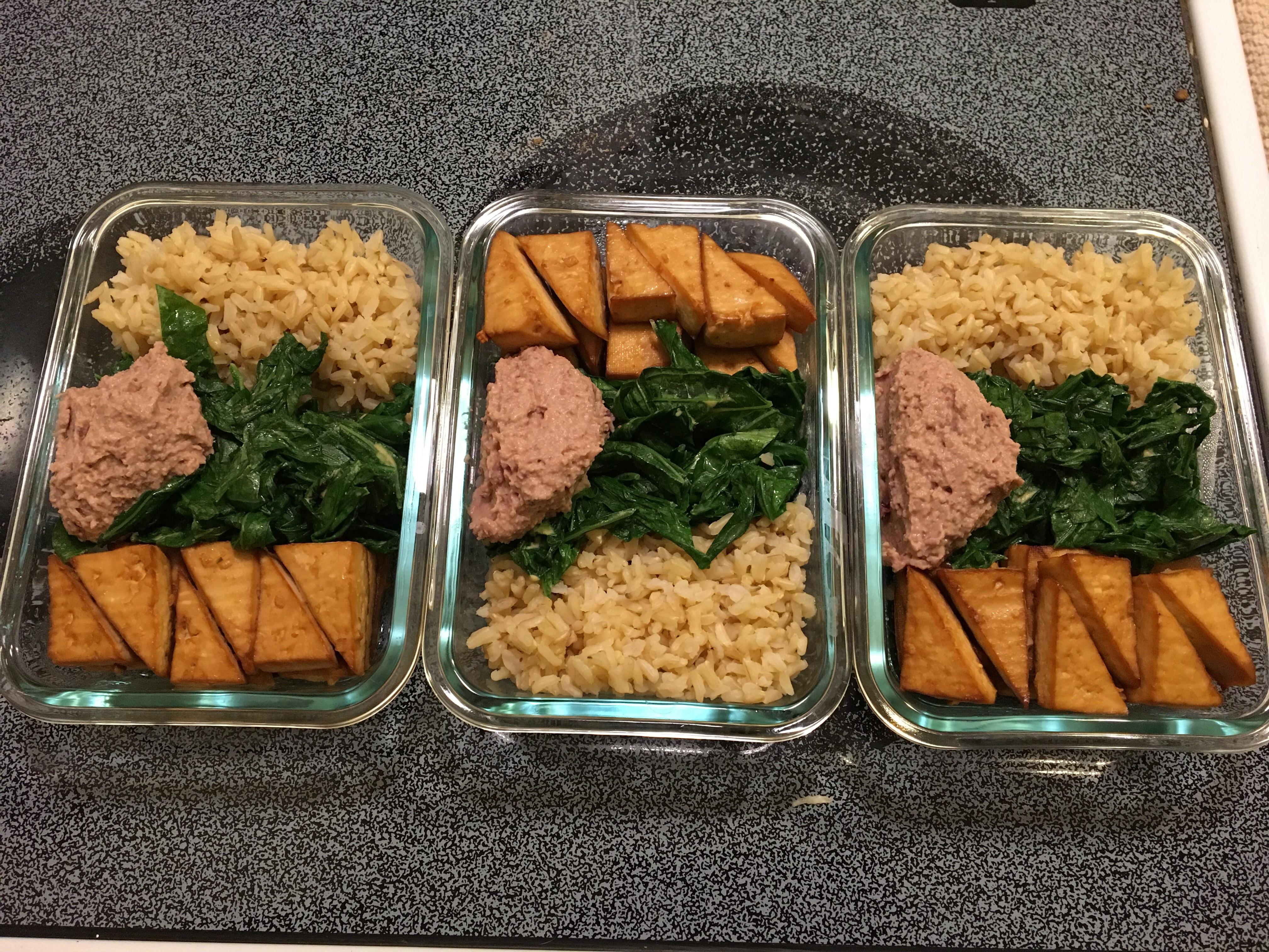 Baked tofu, mustard greens, rice, kalamata hummus r/MeatlessMealPrep