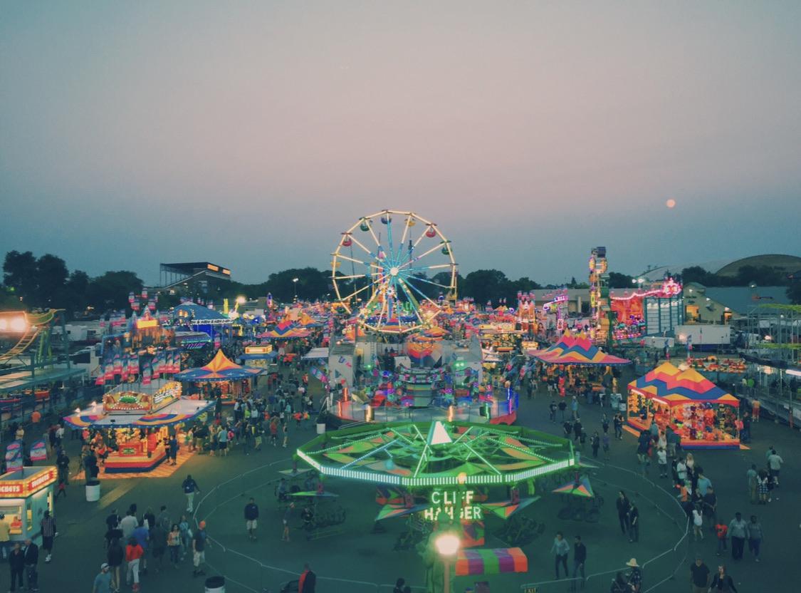 A picture of the Minnesota state fair midway I took atop a funhouse a
