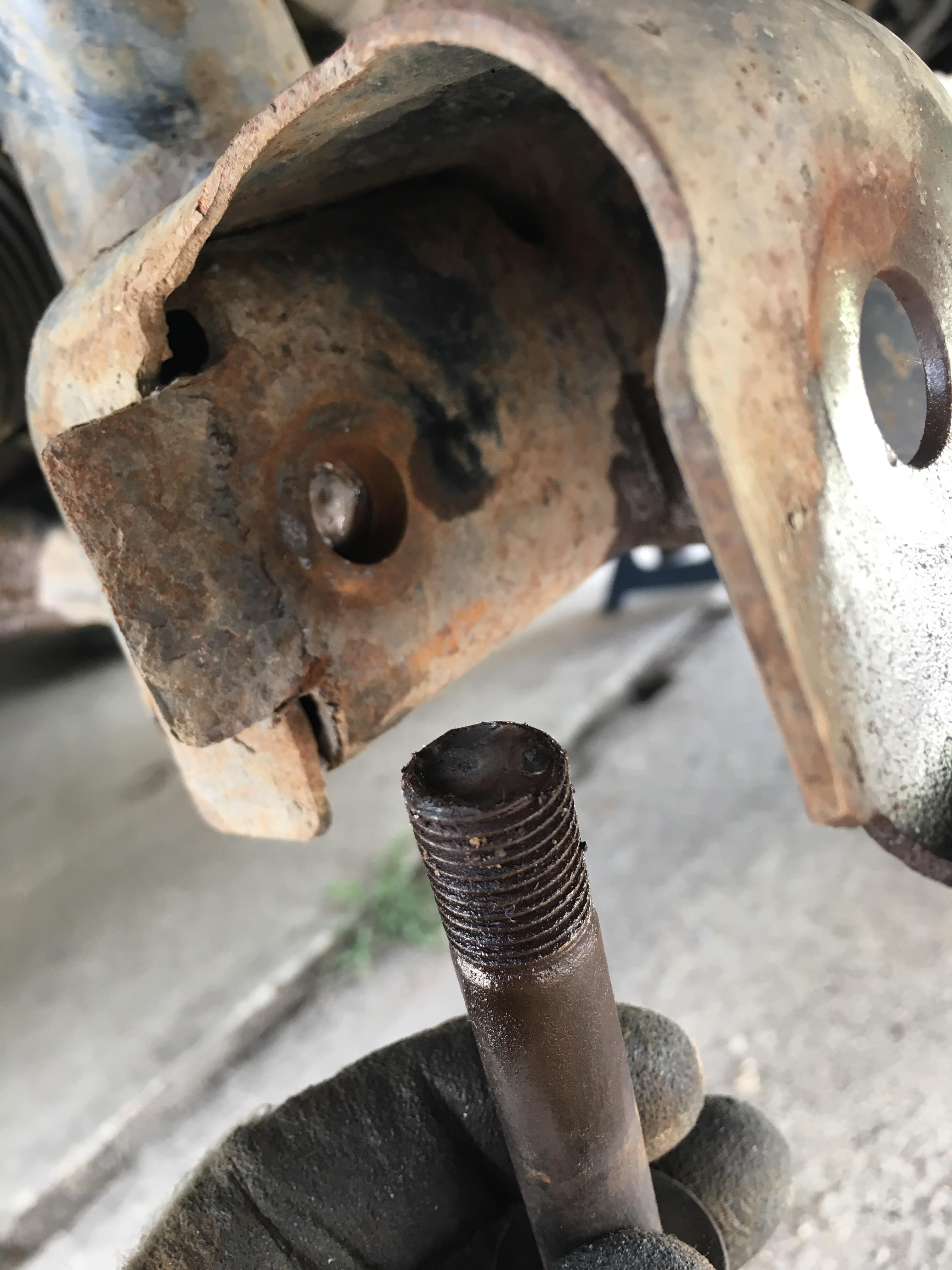 Can someone please help? Removing lower control arm and the front bolt