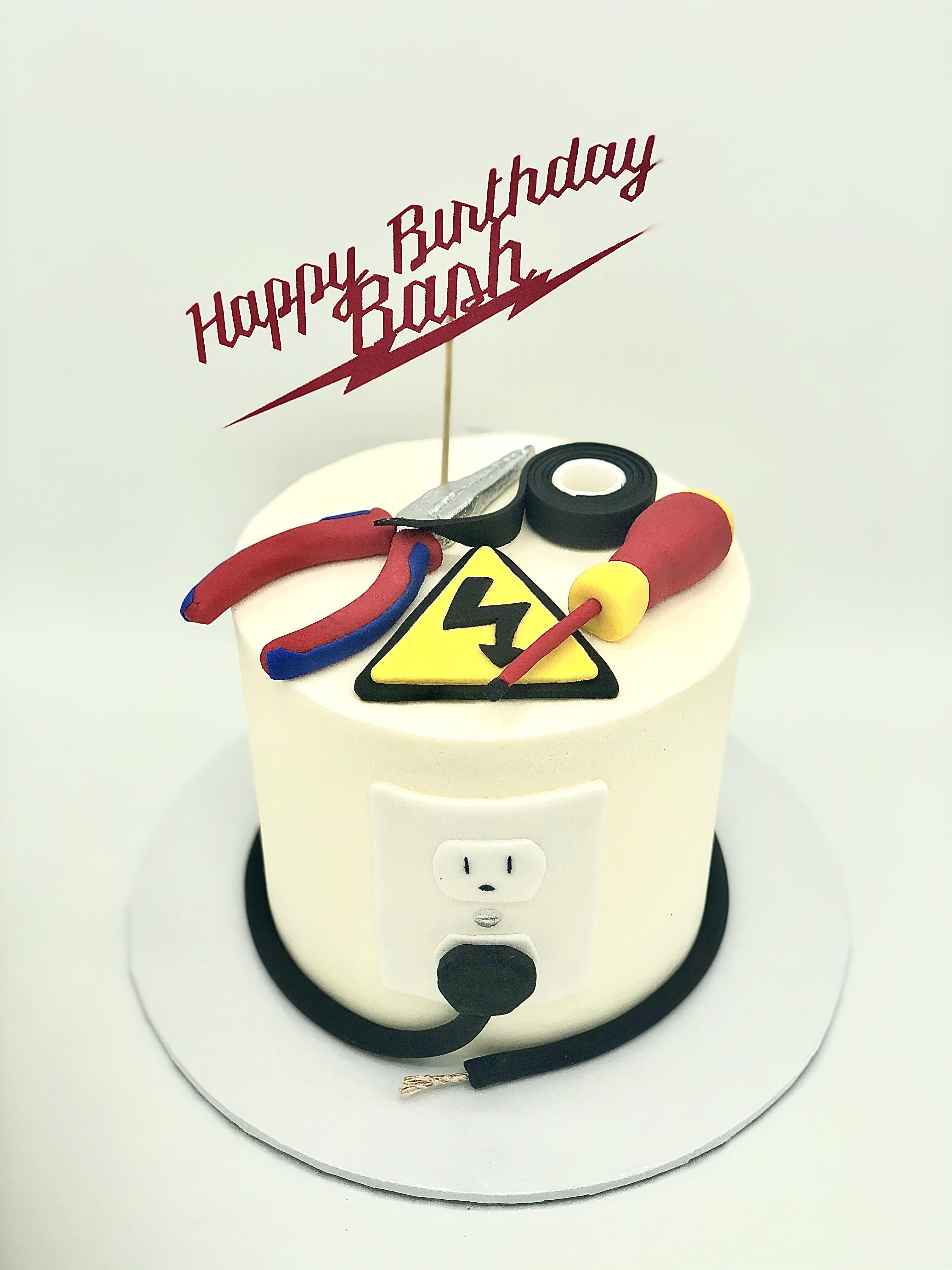 Birthday cake for an electrician with decoration inspired by his