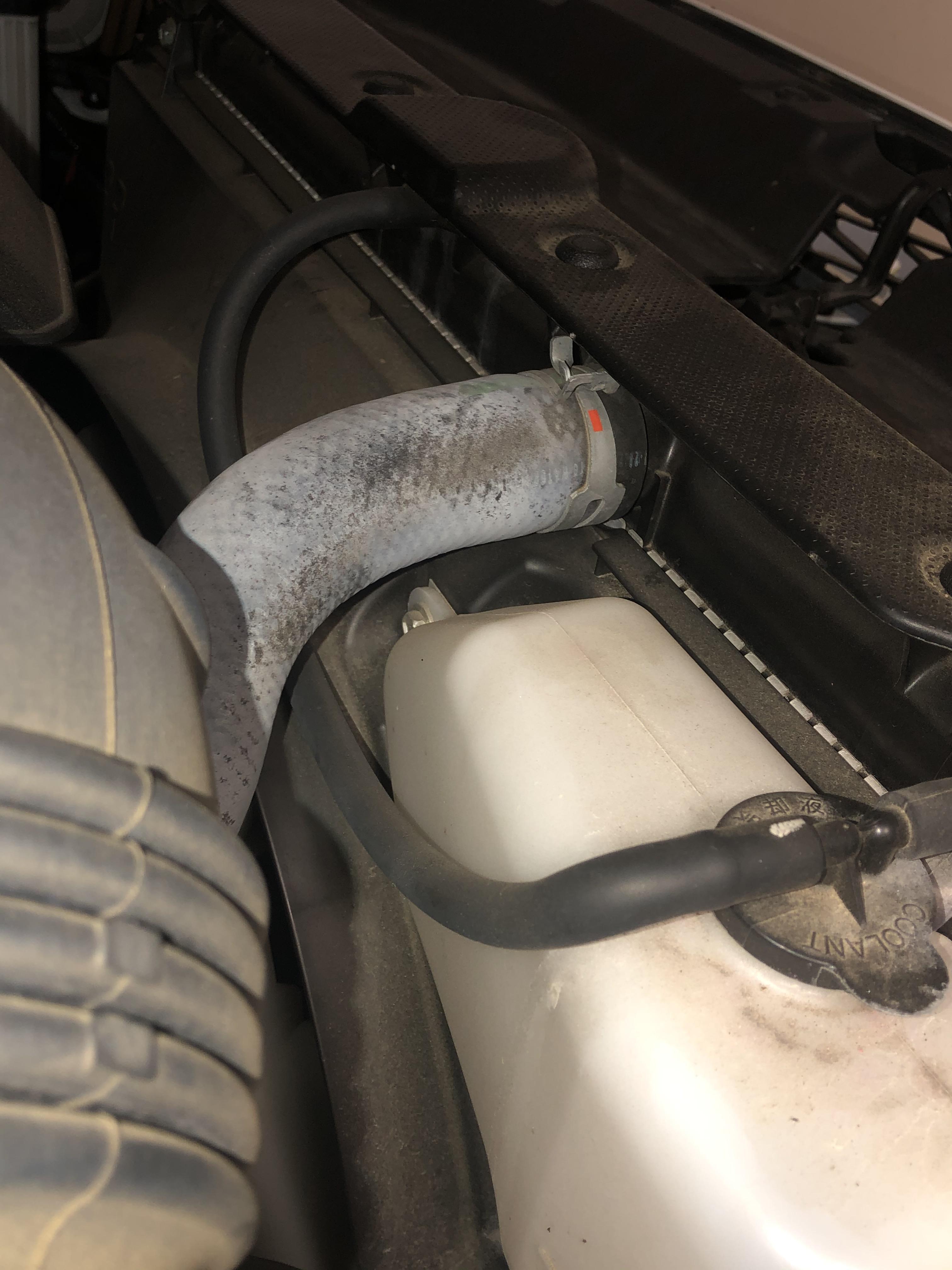 2016 SR5 Upper radiator hose turning white. Has anyone else seen