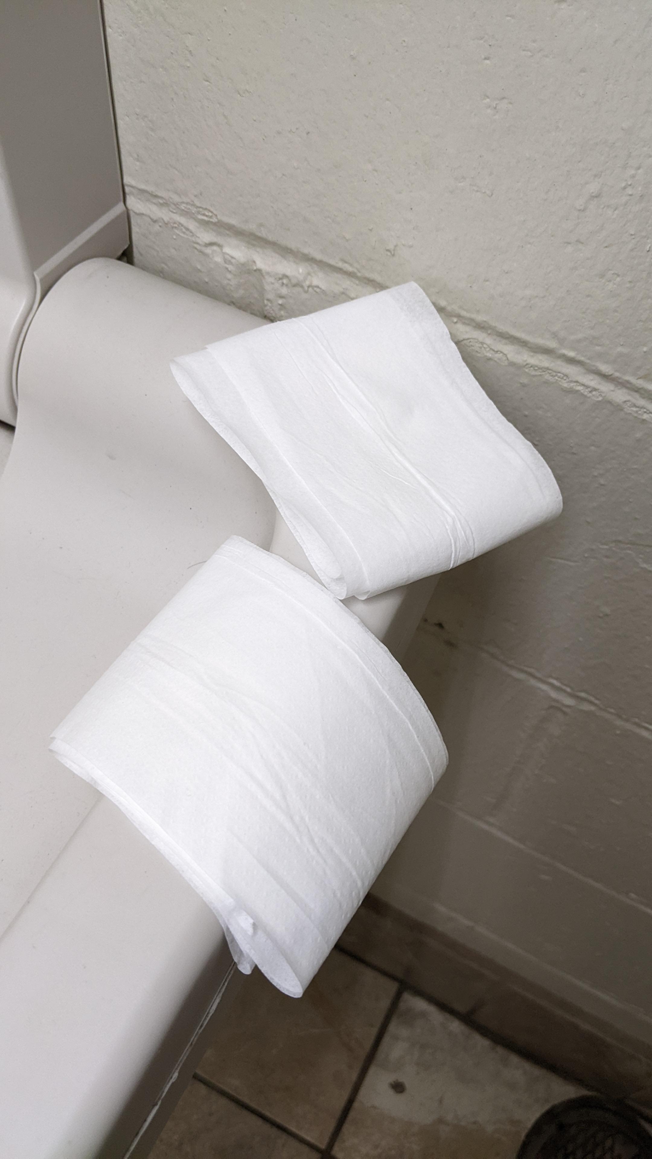 Someone didn't use all their little folded toilet paper, and left two