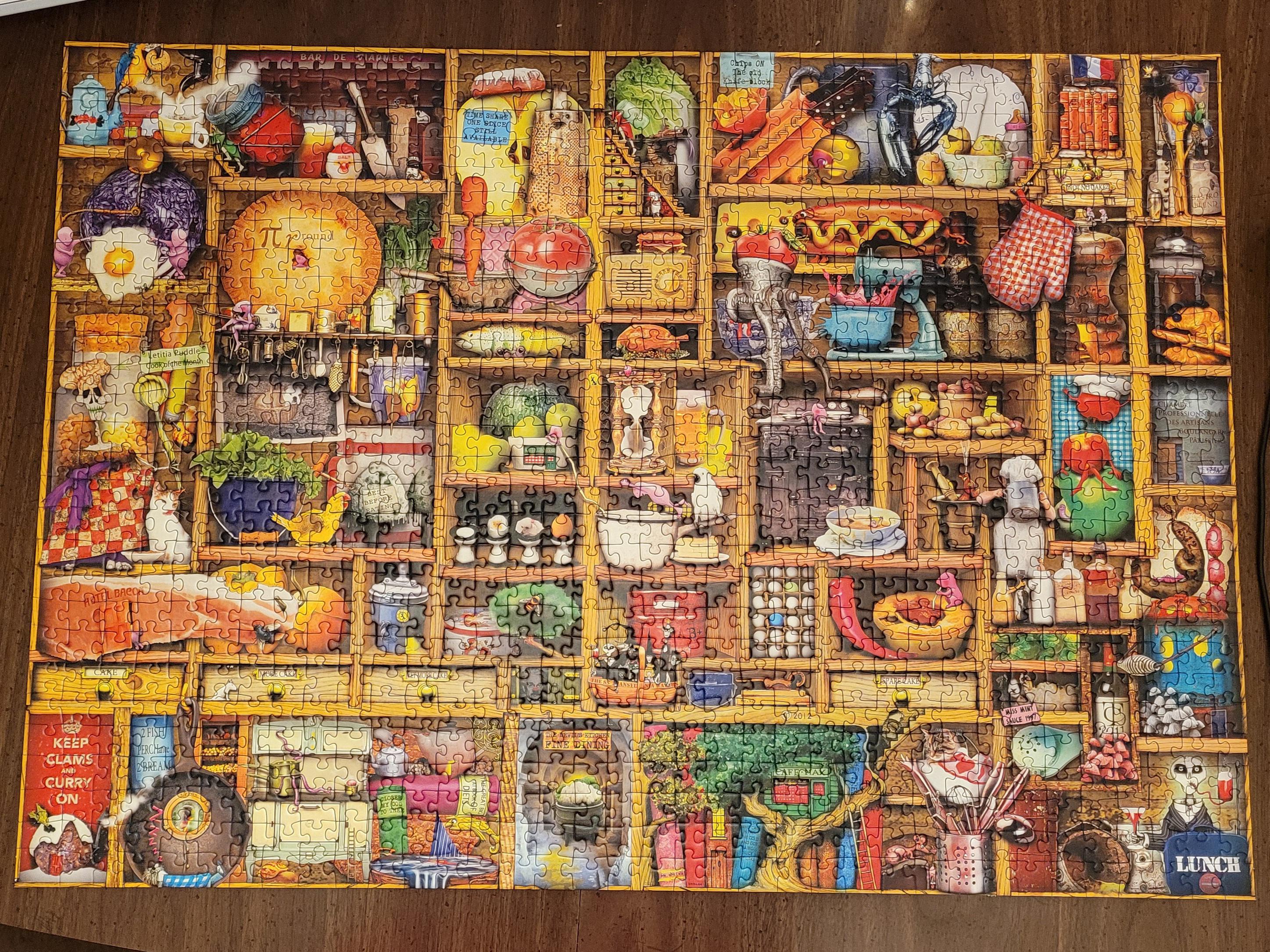 Ravensburger "Kitchen Cupboard" 1000 pieces. Quite a bit creepier than