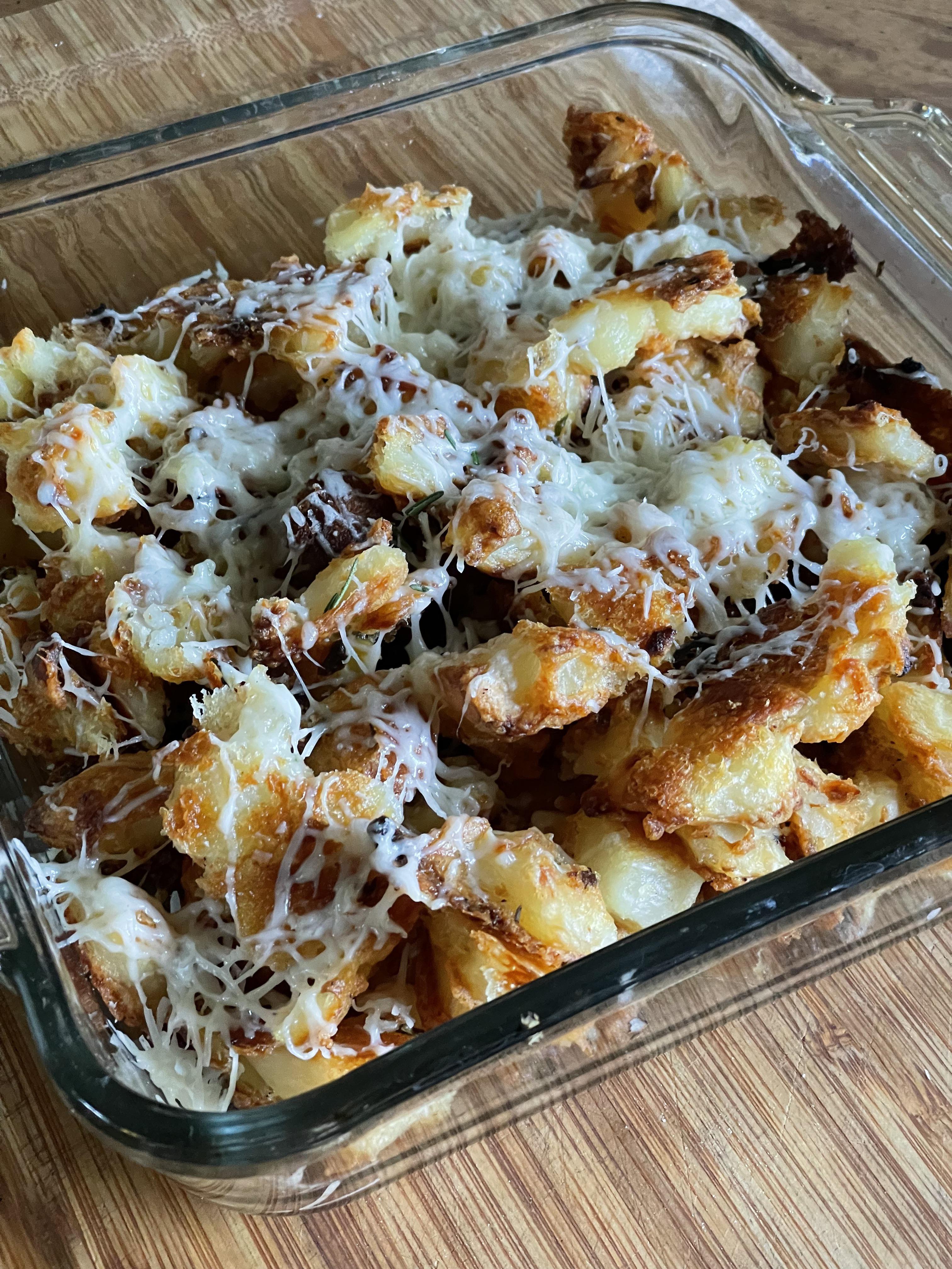 Kenji’s Crispy roasted potatoes topped w Romano r/seriouseats